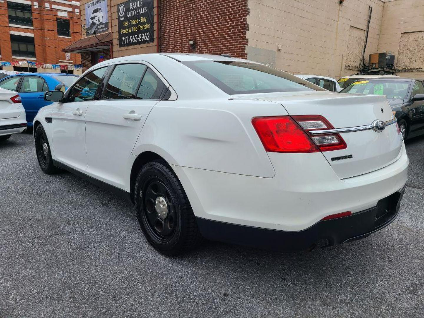 2013 WHITE FORD TAURUS POLICE INTERCEPTOR (1FAHP2MK8DG) with an 3.7L engine, Automatic transmission, located at 117 North Cameron Street, Harrisburg, PA, 17101, (717) 963-8962, 40.266762, -76.875259 - WE FINANCE!!! Good Credit/ Bad Credit/ No Credit - ALL Trade-Ins Welcomed!!! ***Guaranteed Credit Approval*** APPLY ONLINE or CALL us TODAY ;) Internet Prices and Marketplace Prices are SPECIAL discounted ***CASH DEALS*** Retail Prices are higher. Please call us to discuss your cash and finan - Photo#2
