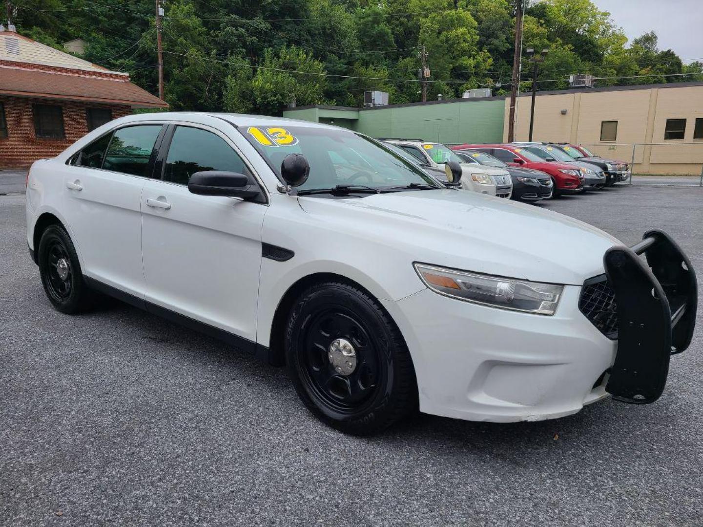 2013 WHITE FORD TAURUS POLICE INTERCEPTOR (1FAHP2MK8DG) with an 3.7L engine, Automatic transmission, located at 117 North Cameron Street, Harrisburg, PA, 17101, (717) 963-8962, 40.266762, -76.875259 - WE FINANCE!!! Good Credit/ Bad Credit/ No Credit - ALL Trade-Ins Welcomed!!! ***Guaranteed Credit Approval*** APPLY ONLINE or CALL us TODAY ;) Internet Prices and Marketplace Prices are SPECIAL discounted ***CASH DEALS*** Retail Prices are higher. Please call us to discuss your cash and finan - Photo#6