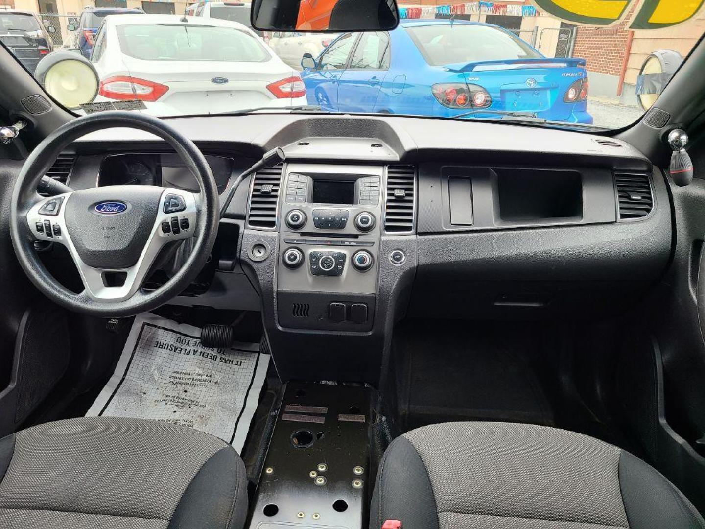 2013 WHITE FORD TAURUS POLICE INTERCEPTOR (1FAHP2MK8DG) with an 3.7L engine, Automatic transmission, located at 117 North Cameron Street, Harrisburg, PA, 17101, (717) 963-8962, 40.266762, -76.875259 - WE FINANCE!!! Good Credit/ Bad Credit/ No Credit - ALL Trade-Ins Welcomed!!! ***Guaranteed Credit Approval*** APPLY ONLINE or CALL us TODAY ;) Internet Prices and Marketplace Prices are SPECIAL discounted ***CASH DEALS*** Retail Prices are higher. Please call us to discuss your cash and finan - Photo#9