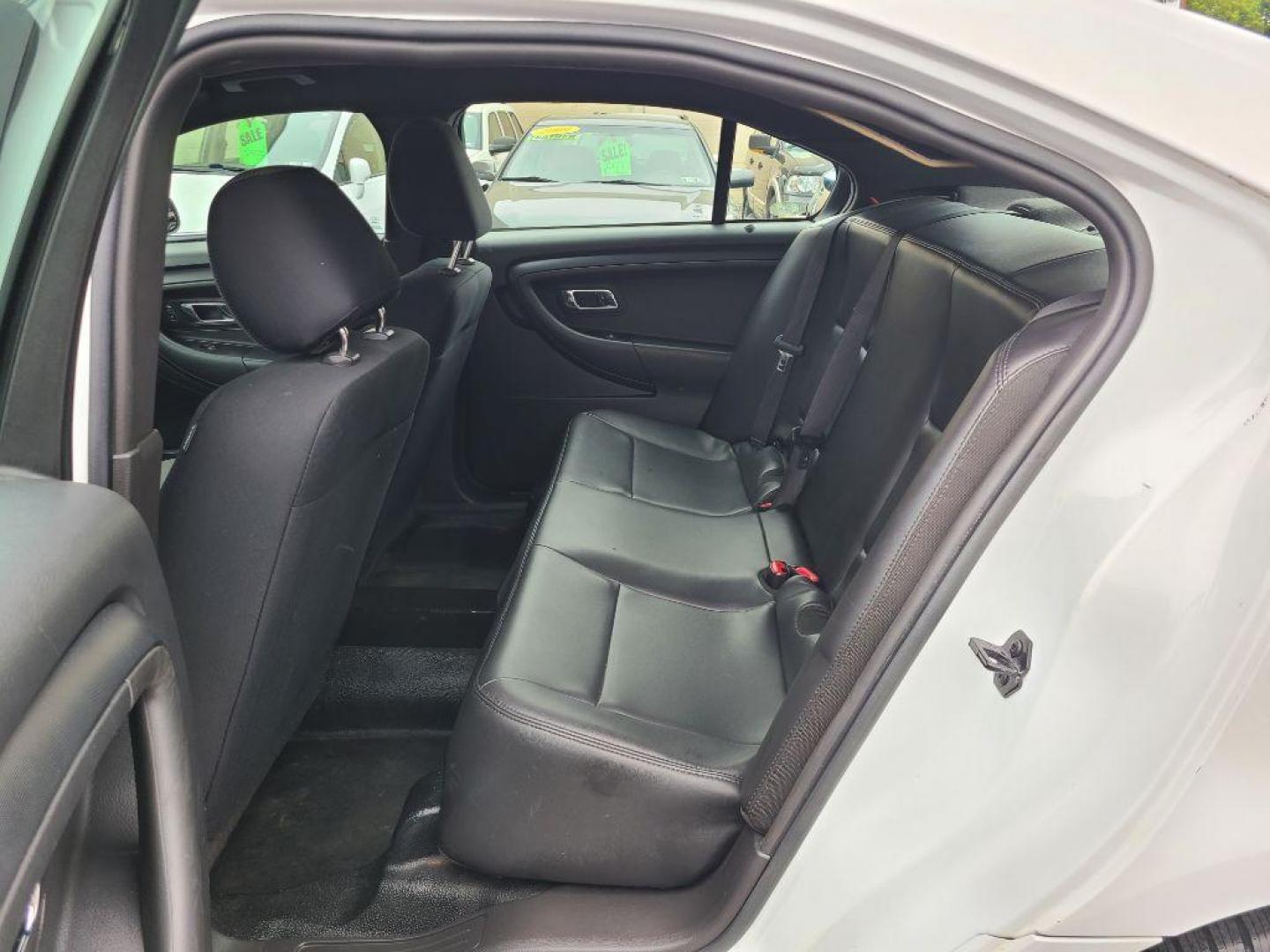 2013 WHITE FORD TAURUS POLICE INTERCEPTOR (1FAHP2MK8DG) with an 3.7L engine, Automatic transmission, located at 117 North Cameron Street, Harrisburg, PA, 17101, (717) 963-8962, 40.266762, -76.875259 - WE FINANCE!!! Good Credit/ Bad Credit/ No Credit - ALL Trade-Ins Welcomed!!! ***Guaranteed Credit Approval*** APPLY ONLINE or CALL us TODAY ;) Internet Prices and Marketplace Prices are SPECIAL discounted ***CASH DEALS*** Retail Prices are higher. Please call us to discuss your cash and finan - Photo#11