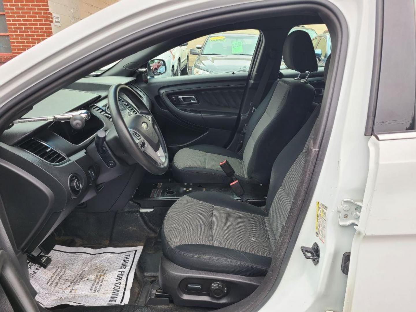 2013 WHITE FORD TAURUS POLICE INTERCEPTOR (1FAHP2MK8DG) with an 3.7L engine, Automatic transmission, located at 117 North Cameron Street, Harrisburg, PA, 17101, (717) 963-8962, 40.266762, -76.875259 - WE FINANCE!!! Good Credit/ Bad Credit/ No Credit - ALL Trade-Ins Welcomed!!! ***Guaranteed Credit Approval*** APPLY ONLINE or CALL us TODAY ;) Internet Prices and Marketplace Prices are SPECIAL discounted ***CASH DEALS*** Retail Prices are higher. Please call us to discuss your cash and finan - Photo#12