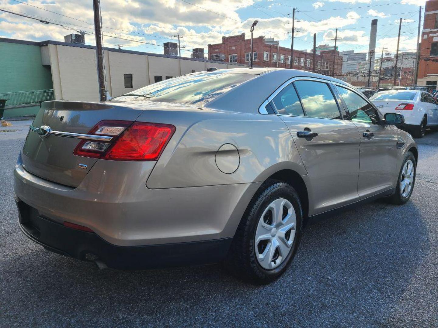 2013 TAN FORD TAURUS POLICE INTERCEPTOR (1FAHP2M82DG) with an 3.5L engine, Automatic transmission, located at 117 North Cameron Street, Harrisburg, PA, 17101, (717) 963-8962, 40.266762, -76.875259 - WE FINANCE!!! Good Credit/ Bad Credit/ No Credit - ALL Trade-Ins Welcomed!!! ***Guaranteed Credit Approval*** APPLY ONLINE or CALL us TODAY ;) Please call us to discuss your cash and financing options. - Photo#4