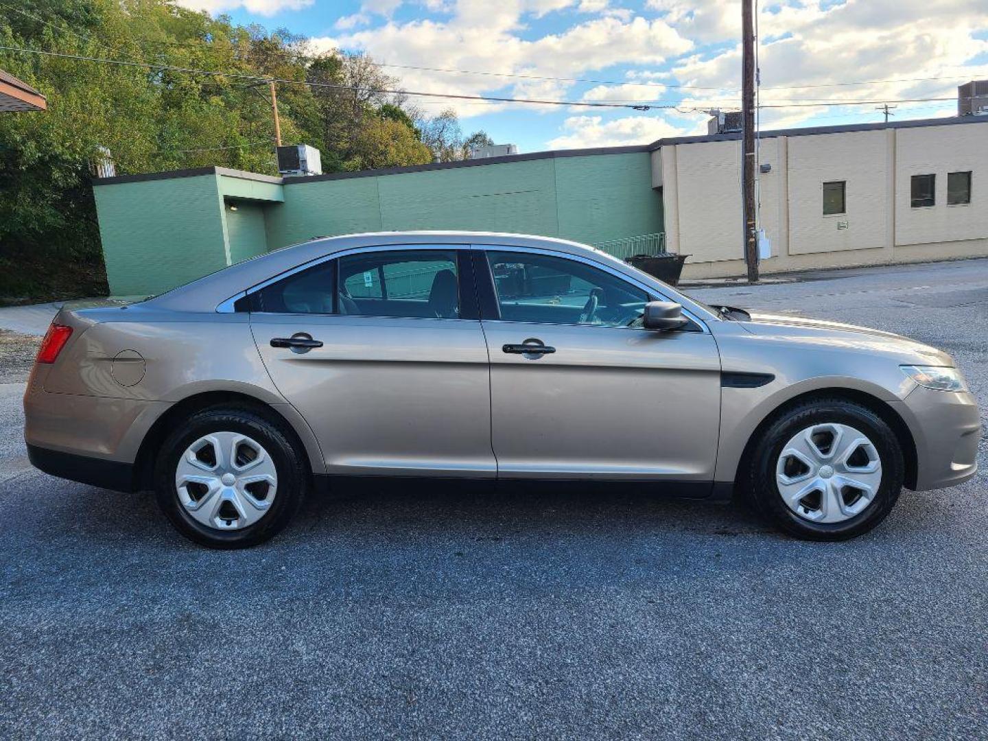 2013 TAN FORD TAURUS POLICE INTERCEPTOR (1FAHP2M82DG) with an 3.5L engine, Automatic transmission, located at 117 North Cameron Street, Harrisburg, PA, 17101, (717) 963-8962, 40.266762, -76.875259 - WE FINANCE!!! Good Credit/ Bad Credit/ No Credit - ALL Trade-Ins Welcomed!!! ***Guaranteed Credit Approval*** APPLY ONLINE or CALL us TODAY ;) Please call us to discuss your cash and financing options. - Photo#5