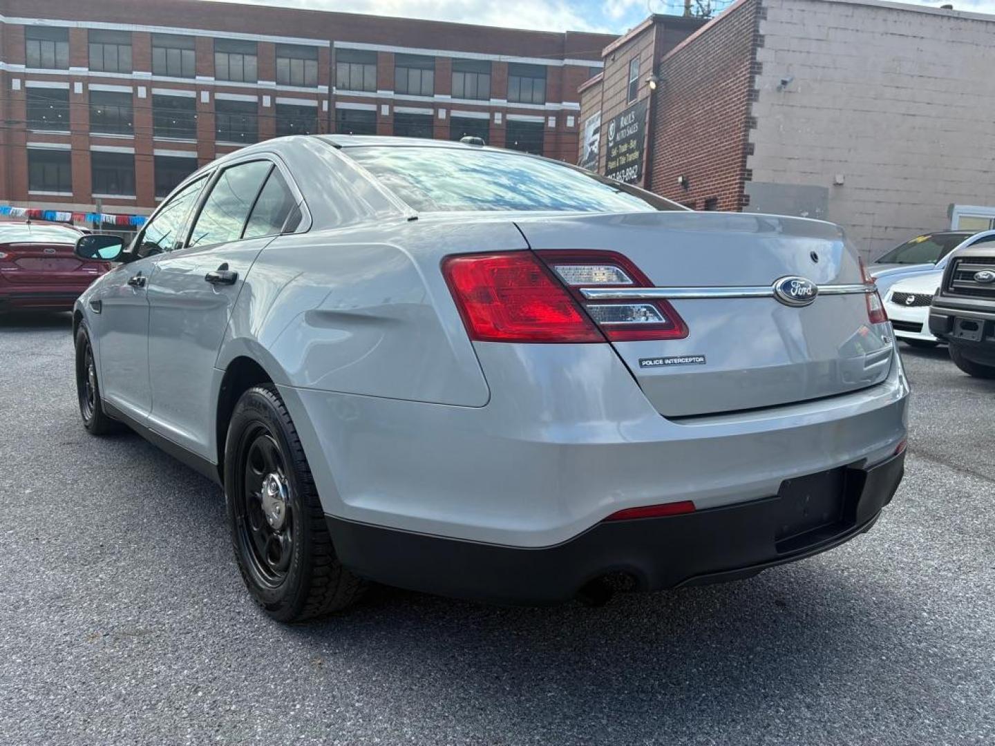 2013 SILVER FORD TAURUS POLICE INTERCEPTOR (1FAHP2MK3DG) with an 3.7L engine, Automatic transmission, located at 117 North Cameron Street, Harrisburg, PA, 17101, (717) 963-8962, 40.266762, -76.875259 - WE FINANCE!!! Good Credit/ Challenged Credit/ No Credit - ALL Trade-Ins Welcomed!!! APPLY ONLINE or CALL us TODAY ;) Please call us to discuss your cash and/or financing options. - Photo#2