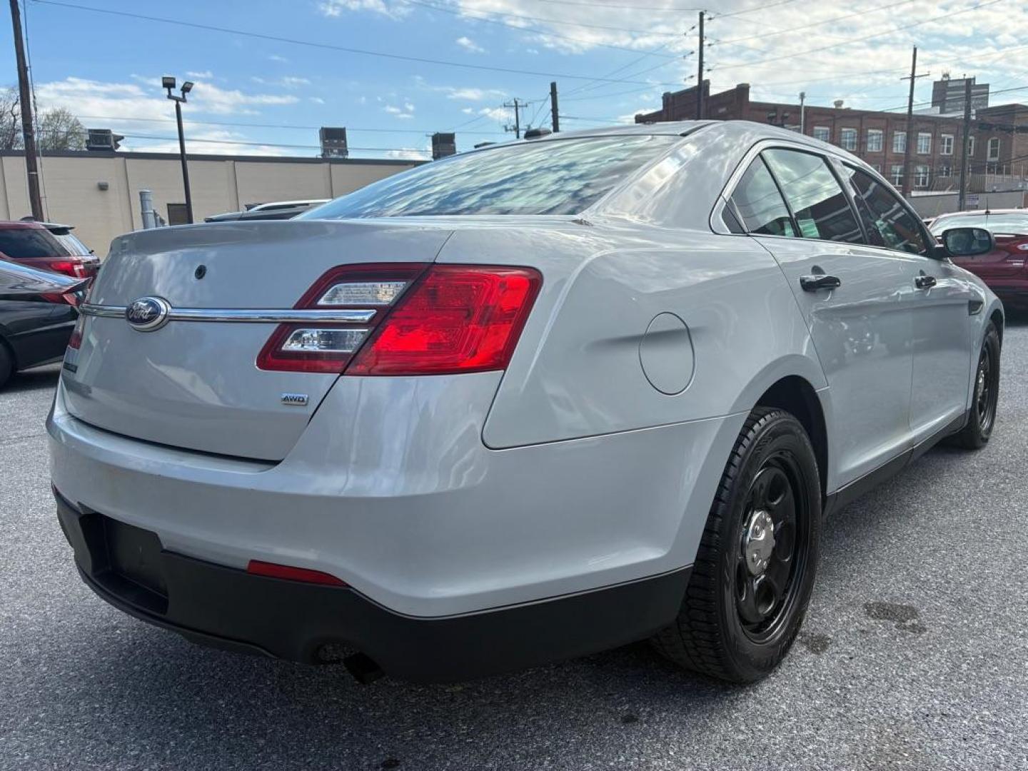 2013 SILVER FORD TAURUS POLICE INTERCEPTOR (1FAHP2MK3DG) with an 3.7L engine, Automatic transmission, located at 117 North Cameron Street, Harrisburg, PA, 17101, (717) 963-8962, 40.266762, -76.875259 - WE FINANCE!!! Good Credit/ Challenged Credit/ No Credit - ALL Trade-Ins Welcomed!!! APPLY ONLINE or CALL us TODAY ;) Please call us to discuss your cash and/or financing options. - Photo#4