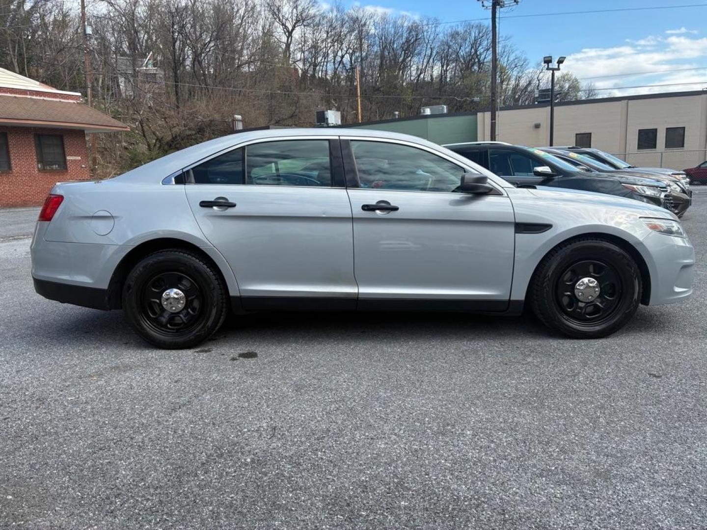 2013 SILVER FORD TAURUS POLICE INTERCEPTOR (1FAHP2MK3DG) with an 3.7L engine, Automatic transmission, located at 117 North Cameron Street, Harrisburg, PA, 17101, (717) 963-8962, 40.266762, -76.875259 - WE FINANCE!!! Good Credit/ Challenged Credit/ No Credit - ALL Trade-Ins Welcomed!!! APPLY ONLINE or CALL us TODAY ;) Please call us to discuss your cash and/or financing options. - Photo#5