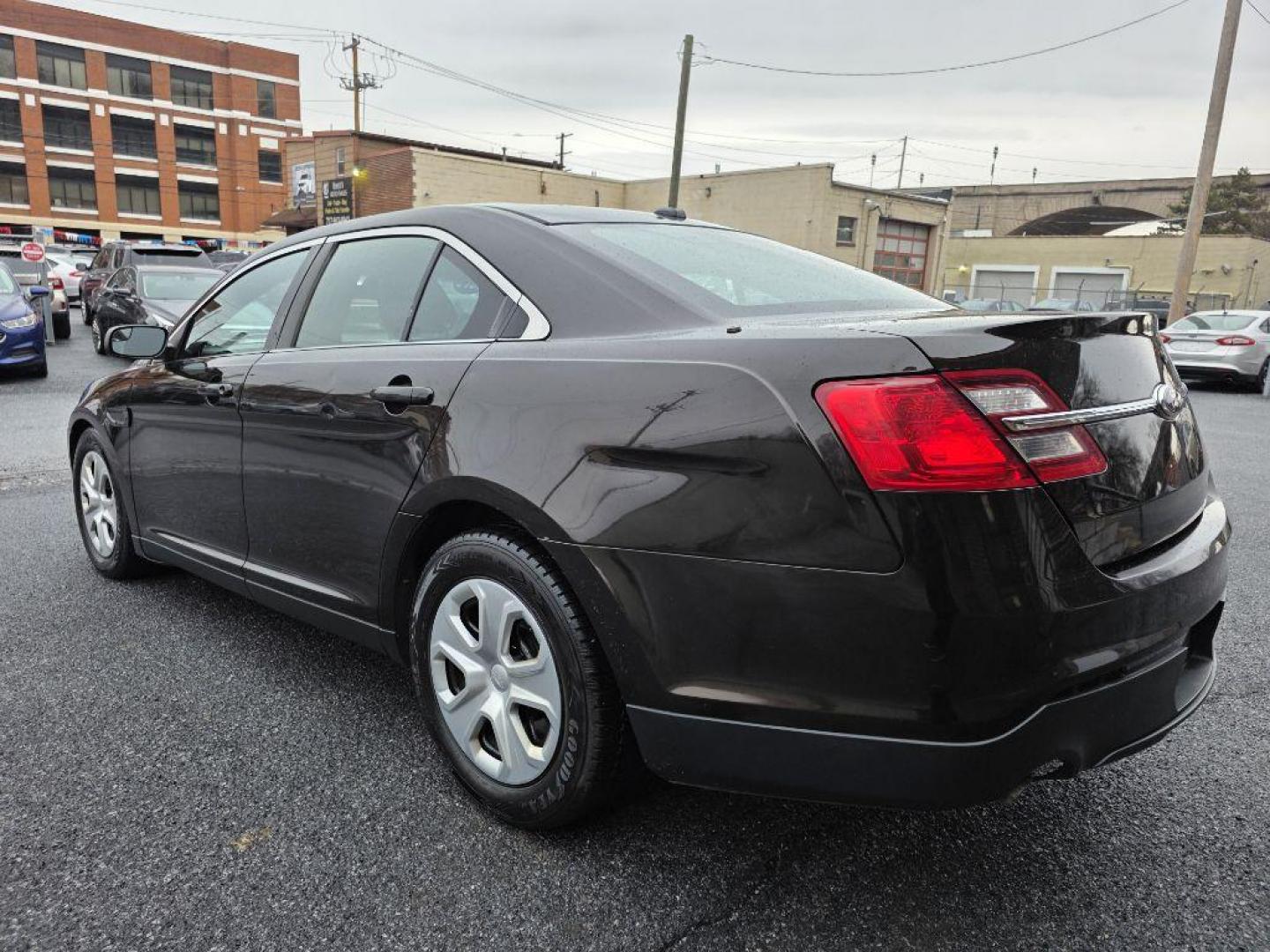 2013 BROWN FORD TAURUS POLICE INTERCEPTOR (1FAHP2MKXDG) with an 3.7L engine, Automatic transmission, located at 117 North Cameron Street, Harrisburg, PA, 17101, (717) 963-8962, 40.266762, -76.875259 - WE FINANCE!!! Good Credit/ Challenged Credit/ No Credit - ALL Trade-Ins Welcomed!!! APPLY ONLINE or CALL us TODAY ;) Please call us to discuss your cash and/or financing options. - Photo#2