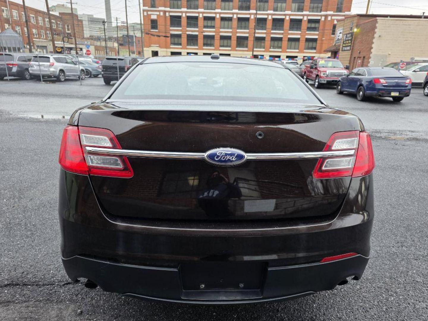 2013 BROWN FORD TAURUS POLICE INTERCEPTOR (1FAHP2MKXDG) with an 3.7L engine, Automatic transmission, located at 117 North Cameron Street, Harrisburg, PA, 17101, (717) 963-8962, 40.266762, -76.875259 - WE FINANCE!!! Good Credit/ Challenged Credit/ No Credit - ALL Trade-Ins Welcomed!!! APPLY ONLINE or CALL us TODAY ;) Please call us to discuss your cash and/or financing options. - Photo#3