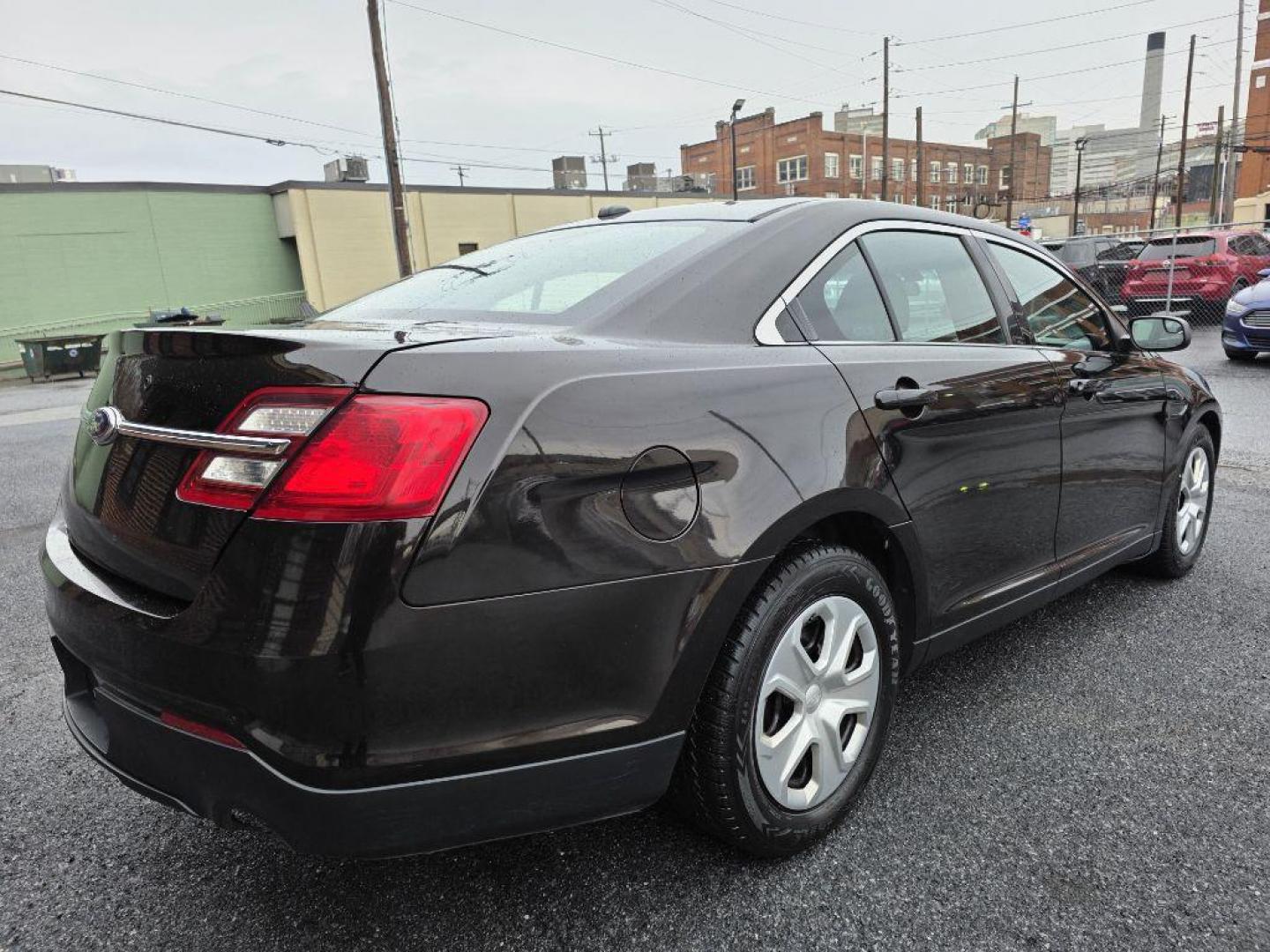 2013 BROWN FORD TAURUS POLICE INTERCEPTOR (1FAHP2MKXDG) with an 3.7L engine, Automatic transmission, located at 117 North Cameron Street, Harrisburg, PA, 17101, (717) 963-8962, 40.266762, -76.875259 - WE FINANCE!!! Good Credit/ Challenged Credit/ No Credit - ALL Trade-Ins Welcomed!!! APPLY ONLINE or CALL us TODAY ;) Please call us to discuss your cash and/or financing options. - Photo#4