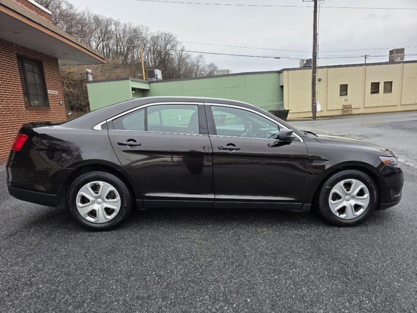 2013 BROWN FORD TAURUS POLICE INTERCEPTOR (1FAHP2MKXDG) with an 3.7L engine, Automatic transmission, located at 117 North Cameron Street, Harrisburg, PA, 17101, (717) 963-8962, 40.266762, -76.875259 - WE FINANCE!!! Good Credit/ Challenged Credit/ No Credit - ALL Trade-Ins Welcomed!!! APPLY ONLINE or CALL us TODAY ;) Please call us to discuss your cash and/or financing options. - Photo#5