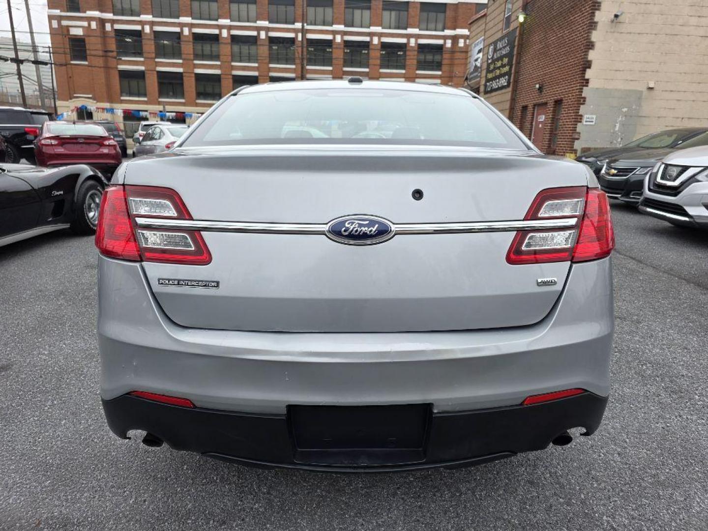 2013 SILVER FORD TAURUS POLICE INTERCEPTOR (1FAHP2M87DG) with an 3.5L engine, Automatic transmission, located at 117 North Cameron Street, Harrisburg, PA, 17101, (717) 963-8962, 40.266762, -76.875259 - WE FINANCE!!! Good Credit/ Bad Credit/ No Credit - ALL Trade-Ins Welcomed!!! ***Guaranteed Credit Approval*** APPLY ONLINE or CALL us TODAY ;) Please call us to discuss your cash and financing options. - Photo#2