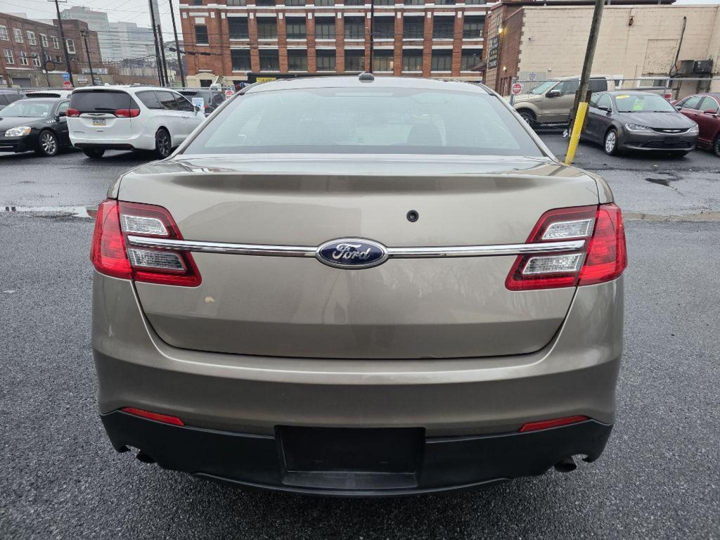 2013 GOLD FORD TAURUS POLICE INTERCEPTOR (1FAHP2M87DG) with an 3.5L engine, Automatic transmission, located at 117 North Cameron Street, Harrisburg, PA, 17101, (717) 963-8962, 40.266762, -76.875259 - WE FINANCE!!! Good Credit/ Challenged Credit/ No Credit - ALL Trade-Ins Welcomed!!! APPLY ONLINE or CALL us TODAY ;) Please call us to discuss your cash and/or financing options. - Photo#3
