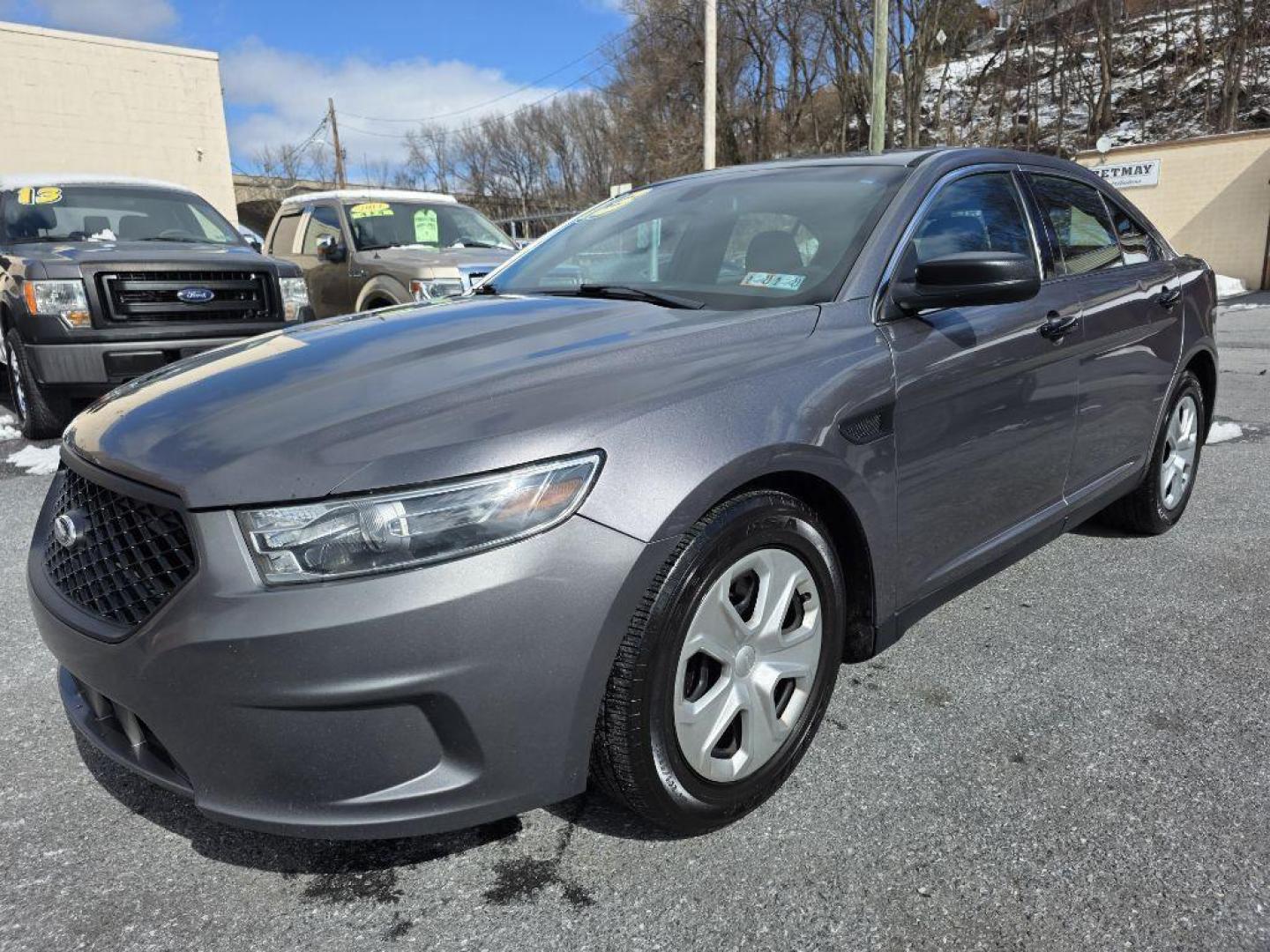2013 GRAY FORD TAURUS POLICE INTERCEPTOR (1FAHP2M85DG) with an 3.5L engine, Automatic transmission, located at 117 North Cameron Street, Harrisburg, PA, 17101, (717) 963-8962, 40.266762, -76.875259 - WE FINANCE!!! Good Credit/ Challenged Credit/ No Credit - ALL Trade-Ins Welcomed!!! APPLY ONLINE or CALL us TODAY ;) Please call us to discuss your cash and/or financing options. - Photo#0