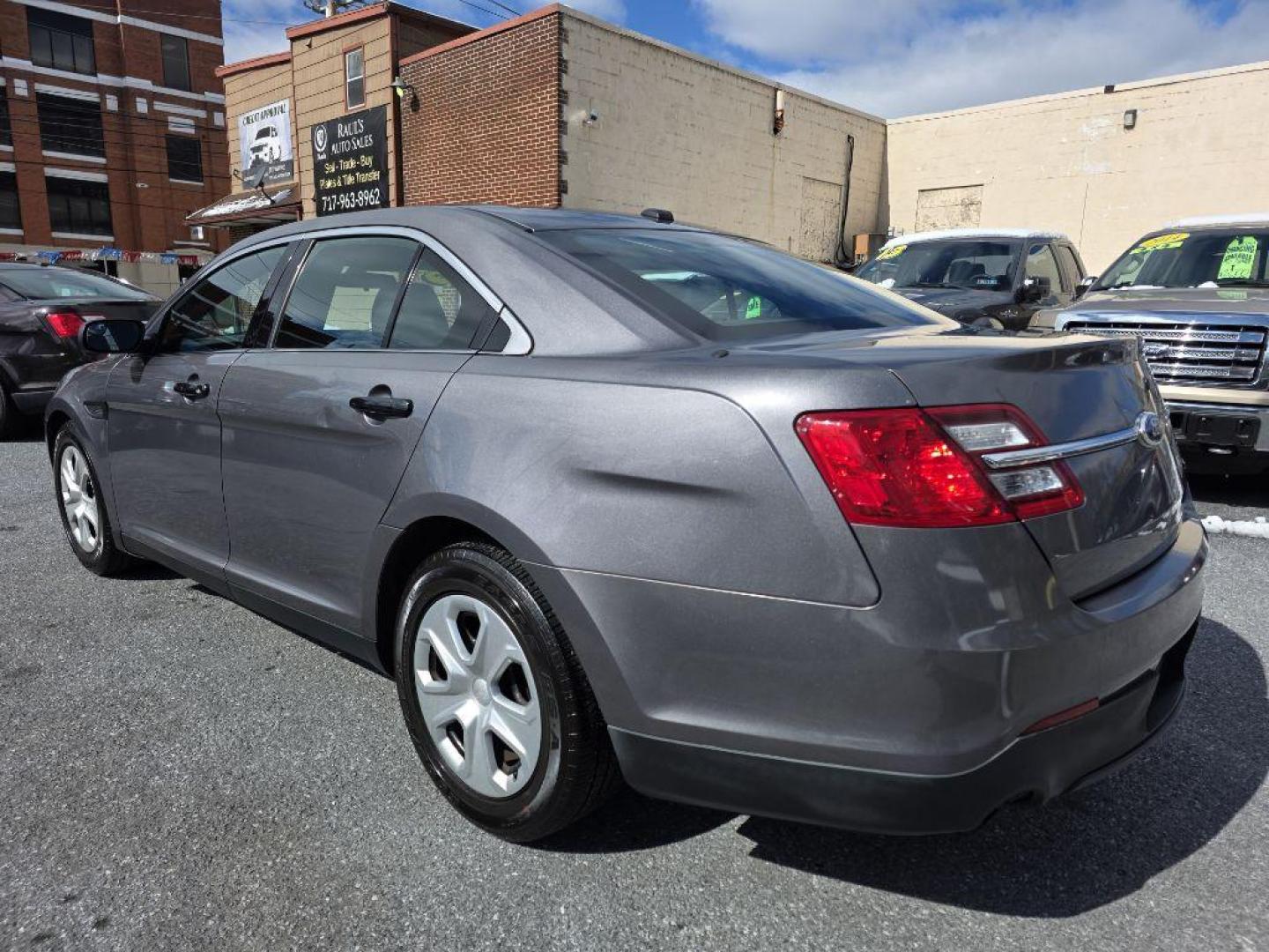 2013 GRAY FORD TAURUS POLICE INTERCEPTOR (1FAHP2M85DG) with an 3.5L engine, Automatic transmission, located at 117 North Cameron Street, Harrisburg, PA, 17101, (717) 963-8962, 40.266762, -76.875259 - WE FINANCE!!! Good Credit/ Challenged Credit/ No Credit - ALL Trade-Ins Welcomed!!! APPLY ONLINE or CALL us TODAY ;) Please call us to discuss your cash and/or financing options. - Photo#1