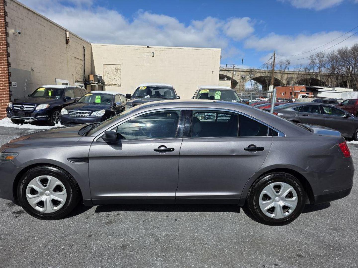 2013 GRAY FORD TAURUS POLICE INTERCEPTOR (1FAHP2M85DG) with an 3.5L engine, Automatic transmission, located at 117 North Cameron Street, Harrisburg, PA, 17101, (717) 963-8962, 40.266762, -76.875259 - WE FINANCE!!! Good Credit/ Challenged Credit/ No Credit - ALL Trade-Ins Welcomed!!! APPLY ONLINE or CALL us TODAY ;) Please call us to discuss your cash and/or financing options. - Photo#2