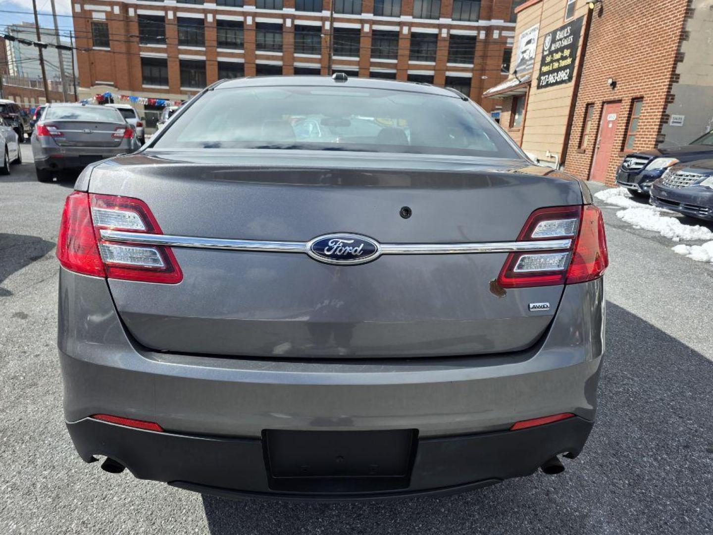 2013 GRAY FORD TAURUS POLICE INTERCEPTOR (1FAHP2M85DG) with an 3.5L engine, Automatic transmission, located at 117 North Cameron Street, Harrisburg, PA, 17101, (717) 963-8962, 40.266762, -76.875259 - WE FINANCE!!! Good Credit/ Challenged Credit/ No Credit - ALL Trade-Ins Welcomed!!! APPLY ONLINE or CALL us TODAY ;) Please call us to discuss your cash and/or financing options. - Photo#3