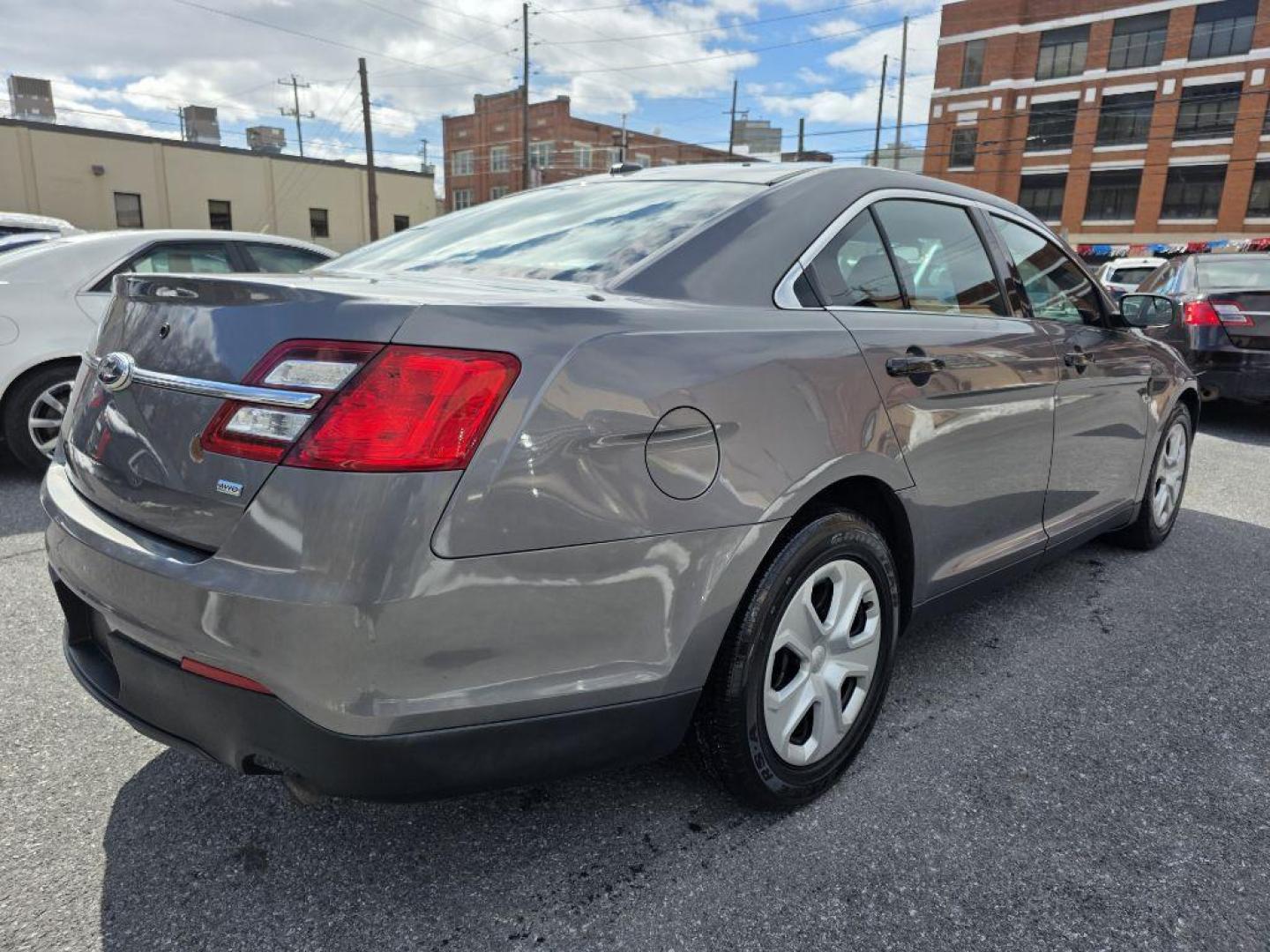 2013 GRAY FORD TAURUS POLICE INTERCEPTOR (1FAHP2M85DG) with an 3.5L engine, Automatic transmission, located at 117 North Cameron Street, Harrisburg, PA, 17101, (717) 963-8962, 40.266762, -76.875259 - WE FINANCE!!! Good Credit/ Challenged Credit/ No Credit - ALL Trade-Ins Welcomed!!! APPLY ONLINE or CALL us TODAY ;) Please call us to discuss your cash and/or financing options. - Photo#4