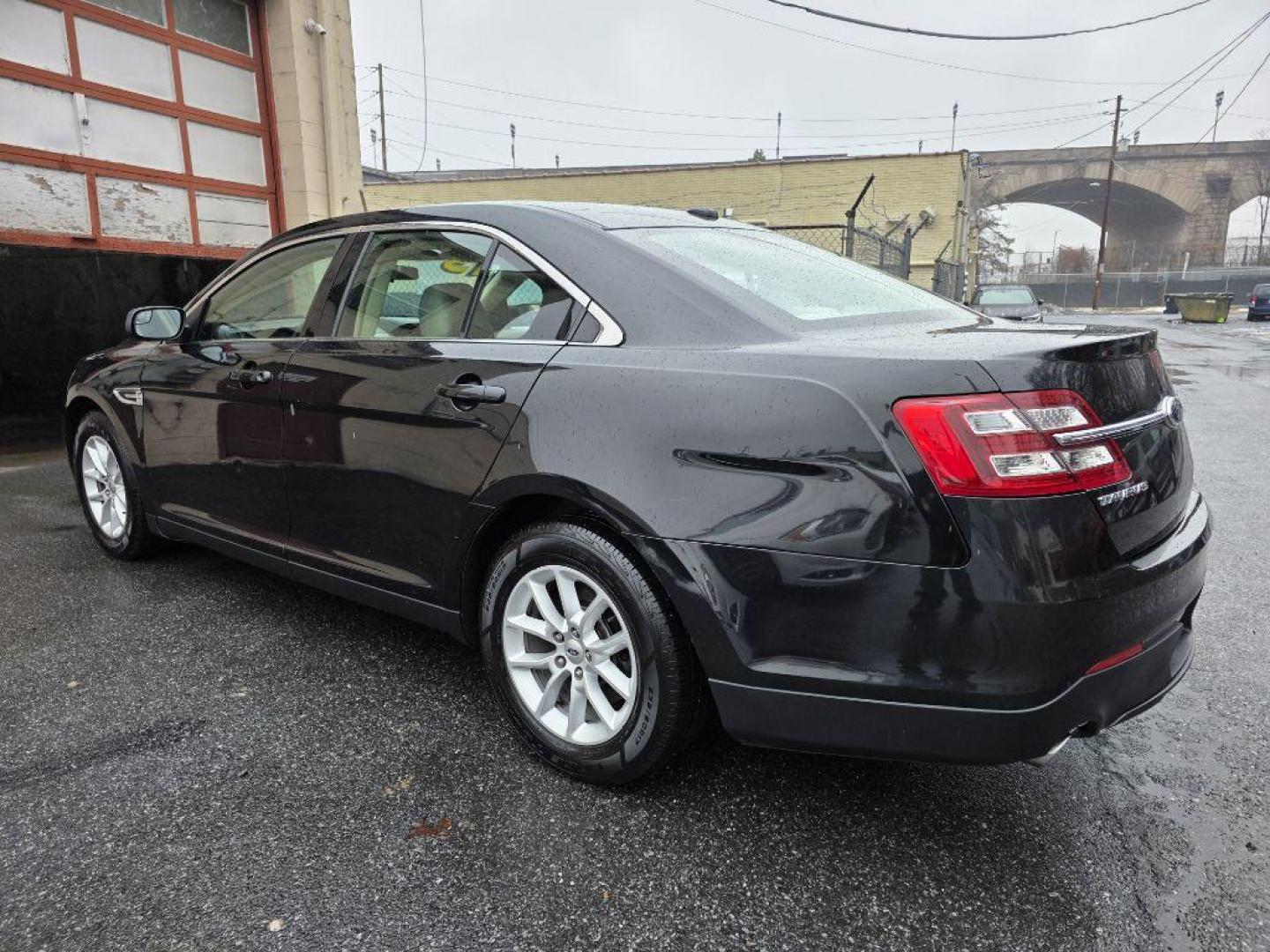 2013 BLACK FORD TAURUS SE (1FAHP2D87DG) with an 3.5L engine, Automatic transmission, located at 117 North Cameron Street, Harrisburg, PA, 17101, (717) 963-8962, 40.266762, -76.875259 - WE FINANCE!!! Good Credit/ Challenged Credit/ No Credit - ALL Trade-Ins Welcomed!!! APPLY ONLINE or CALL us TODAY ;) Please call us to discuss your cash and/or financing options. - Photo#2