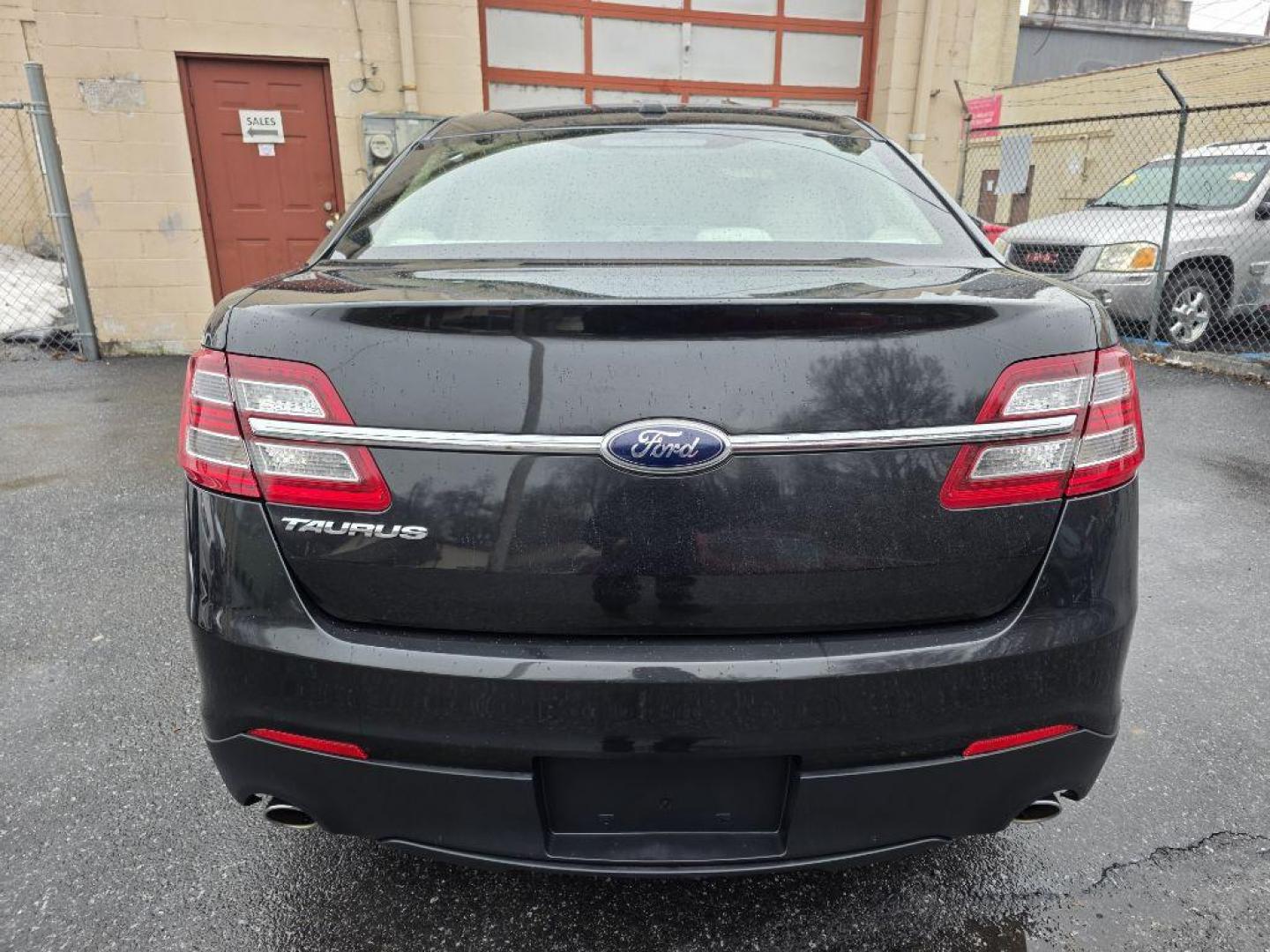 2013 BLACK FORD TAURUS SE (1FAHP2D87DG) with an 3.5L engine, Automatic transmission, located at 117 North Cameron Street, Harrisburg, PA, 17101, (717) 963-8962, 40.266762, -76.875259 - WE FINANCE!!! Good Credit/ Challenged Credit/ No Credit - ALL Trade-Ins Welcomed!!! APPLY ONLINE or CALL us TODAY ;) Please call us to discuss your cash and/or financing options. - Photo#3