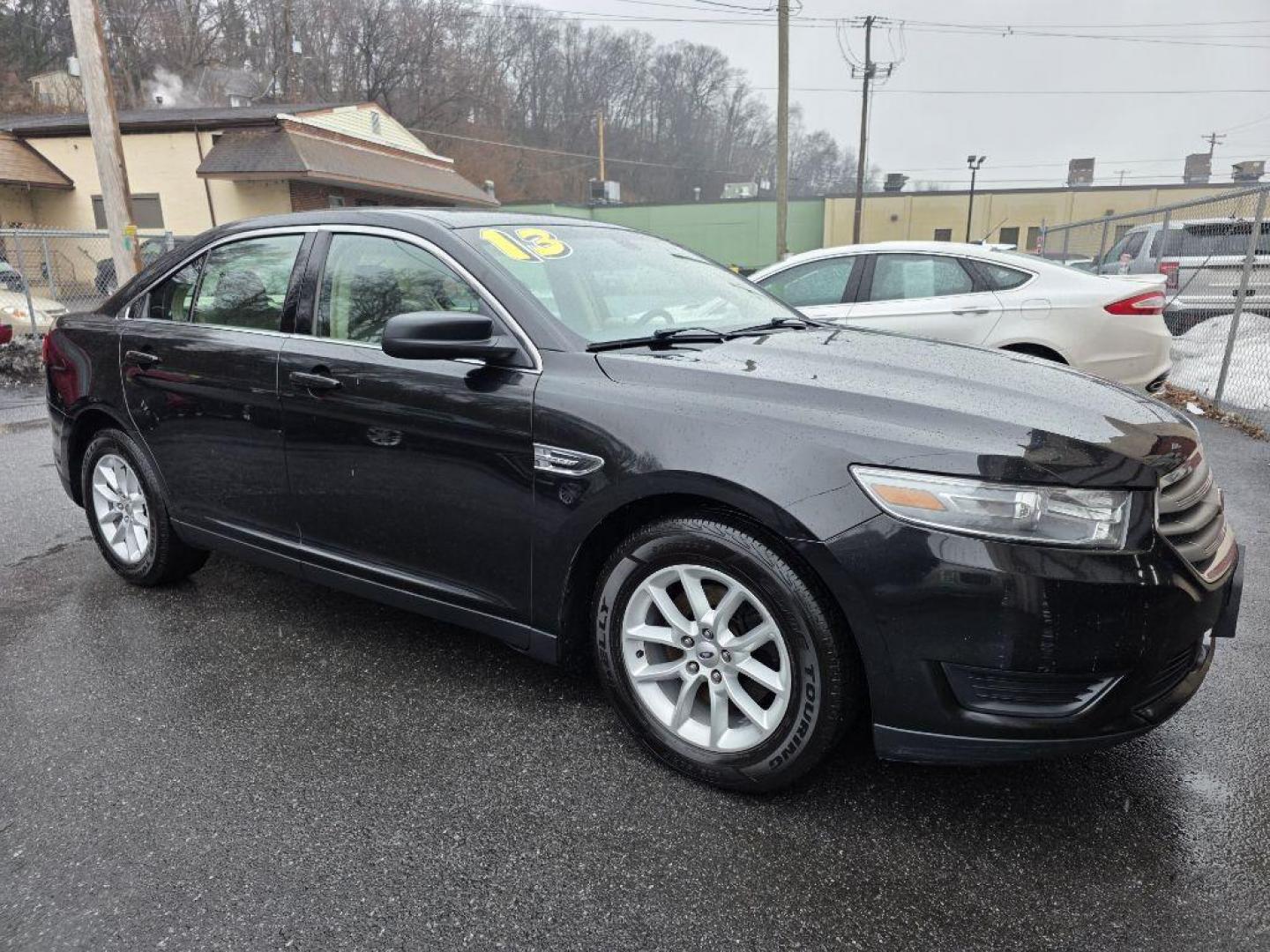 2013 BLACK FORD TAURUS SE (1FAHP2D87DG) with an 3.5L engine, Automatic transmission, located at 117 North Cameron Street, Harrisburg, PA, 17101, (717) 963-8962, 40.266762, -76.875259 - WE FINANCE!!! Good Credit/ Challenged Credit/ No Credit - ALL Trade-Ins Welcomed!!! APPLY ONLINE or CALL us TODAY ;) Please call us to discuss your cash and/or financing options. - Photo#6