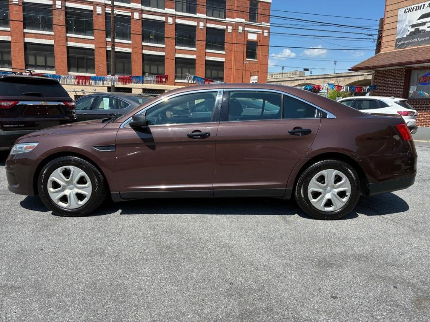 2013 BROWN FORD TAURUS POLICE INTERCEPTOR (1FAHP2M84DG) with an 3.5L engine, Automatic transmission, located at 117 North Cameron Street, Harrisburg, PA, 17101, (717) 963-8962, 40.266762, -76.875259 - WE FINANCE!!! MOST vehicles are available for financing. Good Credit/ Challenged Credit/ No Credit - ALL Trade-Ins Welcomed!!! APPLY ONLINE or CALL us TODAY Please call us to discuss your cash and/or financing options. Thanks for cheching our inventory! We're here to help. - Photo#1