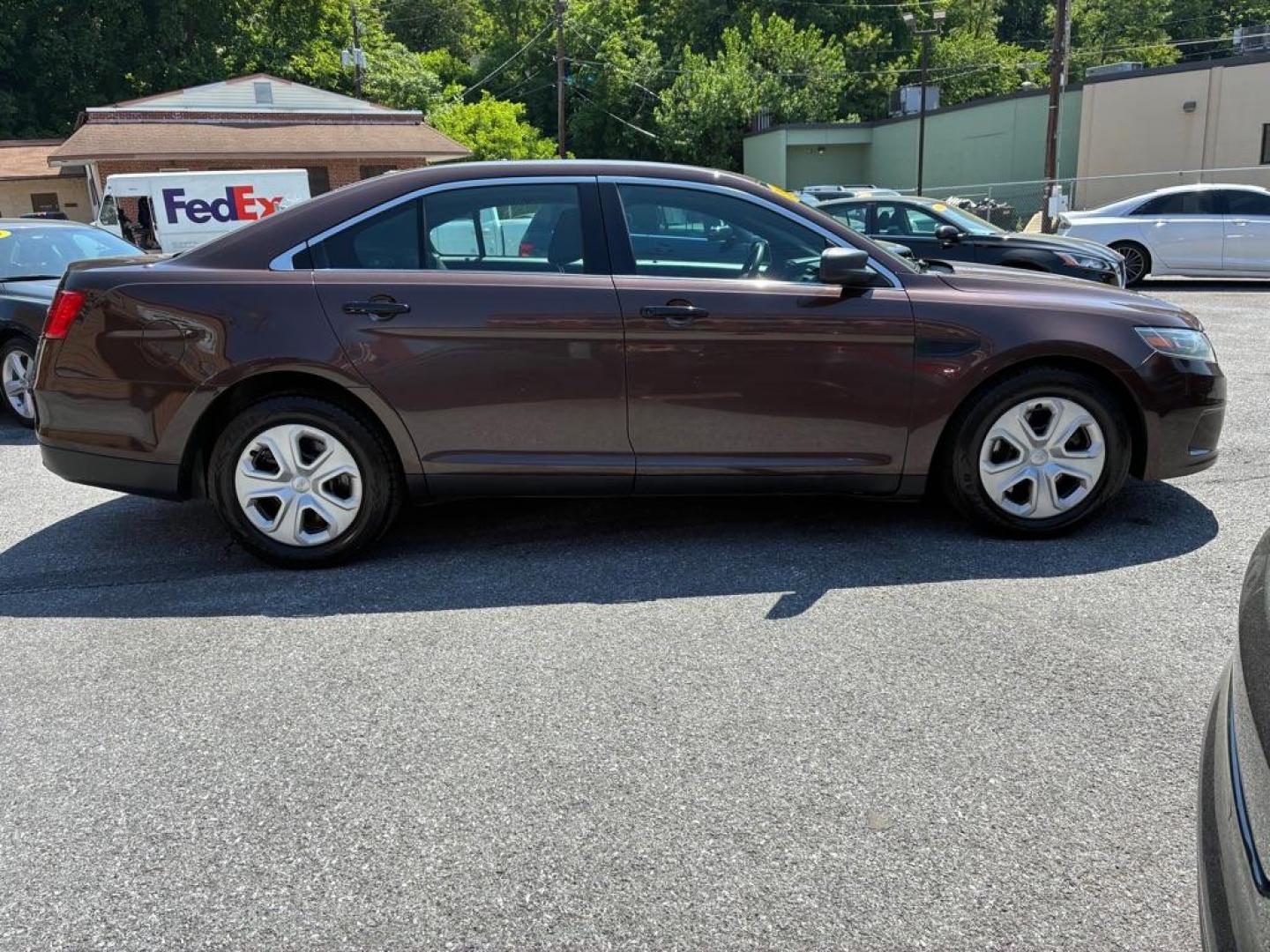 2013 BROWN FORD TAURUS POLICE INTERCEPTOR (1FAHP2M84DG) with an 3.5L engine, Automatic transmission, located at 117 North Cameron Street, Harrisburg, PA, 17101, (717) 963-8962, 40.266762, -76.875259 - WE FINANCE!!! MOST vehicles are available for financing. Good Credit/ Challenged Credit/ No Credit - ALL Trade-Ins Welcomed!!! APPLY ONLINE or CALL us TODAY Please call us to discuss your cash and/or financing options. Thanks for cheching our inventory! We're here to help. - Photo#5