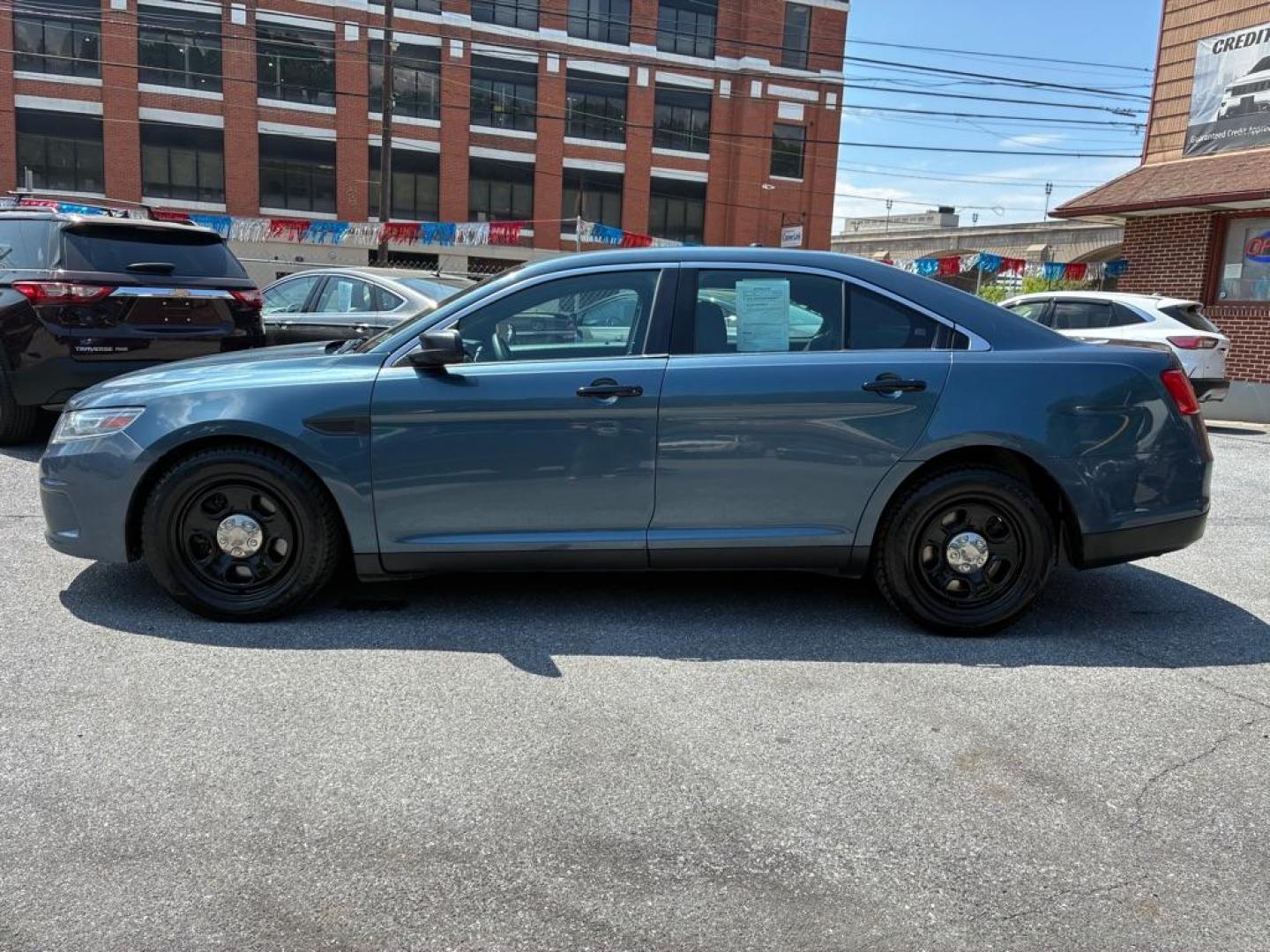 2013 BLUE FORD TAURUS POLICE INTERCEPTOR (1FAHP2M80DG) with an 3.5L engine, Automatic transmission, located at 117 North Cameron Street, Harrisburg, PA, 17101, (717) 963-8962, 40.266762, -76.875259 - WE FINANCE!!! MOST vehicles are available for financing. Good Credit/ Challenged Credit/ No Credit - ALL Trade-Ins Welcomed!!! APPLY ONLINE or CALL us TODAY Please call us to discuss your cash and/or financing options. Thanks for cheching our inventory! We're here to help. - Photo#1