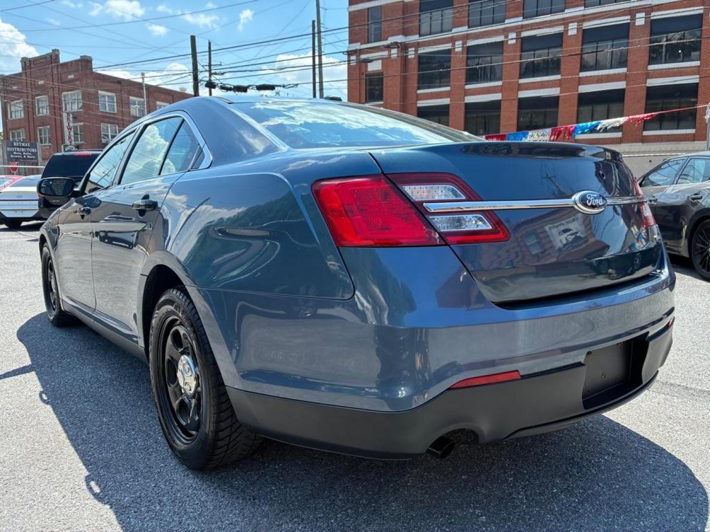 2013 BLUE FORD TAURUS POLICE INTERCEPTOR (1FAHP2M80DG) with an 3.5L engine, Automatic transmission, located at 117 North Cameron Street, Harrisburg, PA, 17101, (717) 963-8962, 40.266762, -76.875259 - WE FINANCE!!! MOST vehicles are available for financing. Good Credit/ Challenged Credit/ No Credit - ALL Trade-Ins Welcomed!!! APPLY ONLINE or CALL us TODAY Please call us to discuss your cash and/or financing options. Thanks for cheching our inventory! We're here to help. - Photo#2