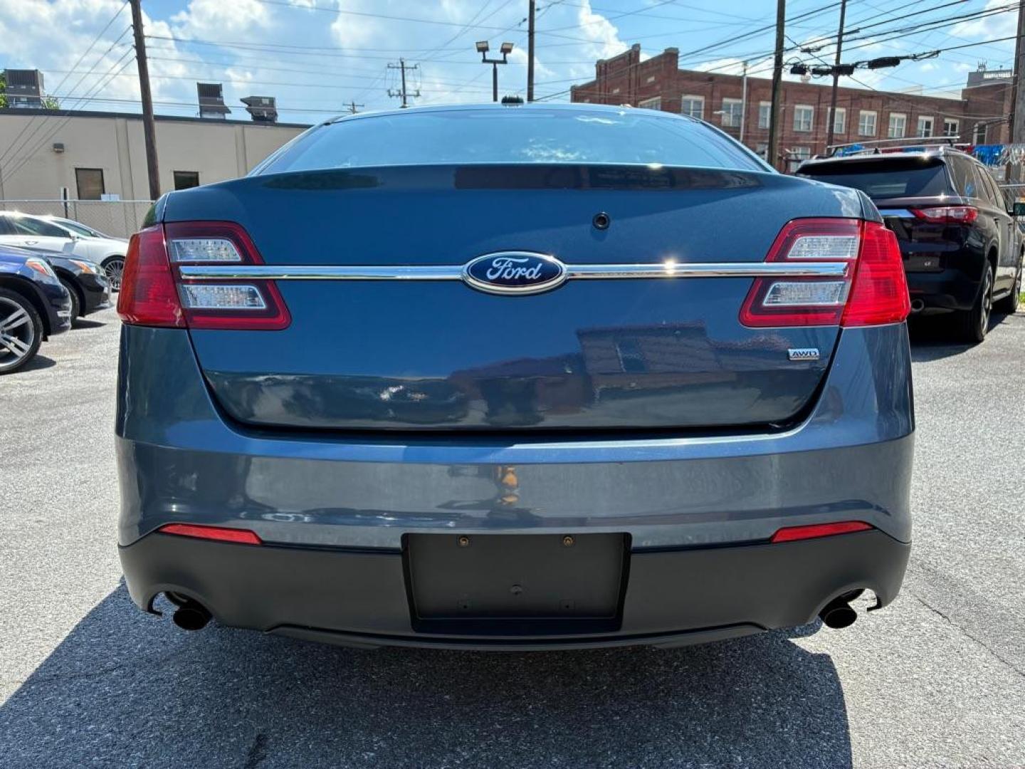 2013 BLUE FORD TAURUS POLICE INTERCEPTOR (1FAHP2M80DG) with an 3.5L engine, Automatic transmission, located at 117 North Cameron Street, Harrisburg, PA, 17101, (717) 963-8962, 40.266762, -76.875259 - WE FINANCE!!! MOST vehicles are available for financing. Good Credit/ Challenged Credit/ No Credit - ALL Trade-Ins Welcomed!!! APPLY ONLINE or CALL us TODAY Please call us to discuss your cash and/or financing options. Thanks for cheching our inventory! We're here to help. - Photo#3