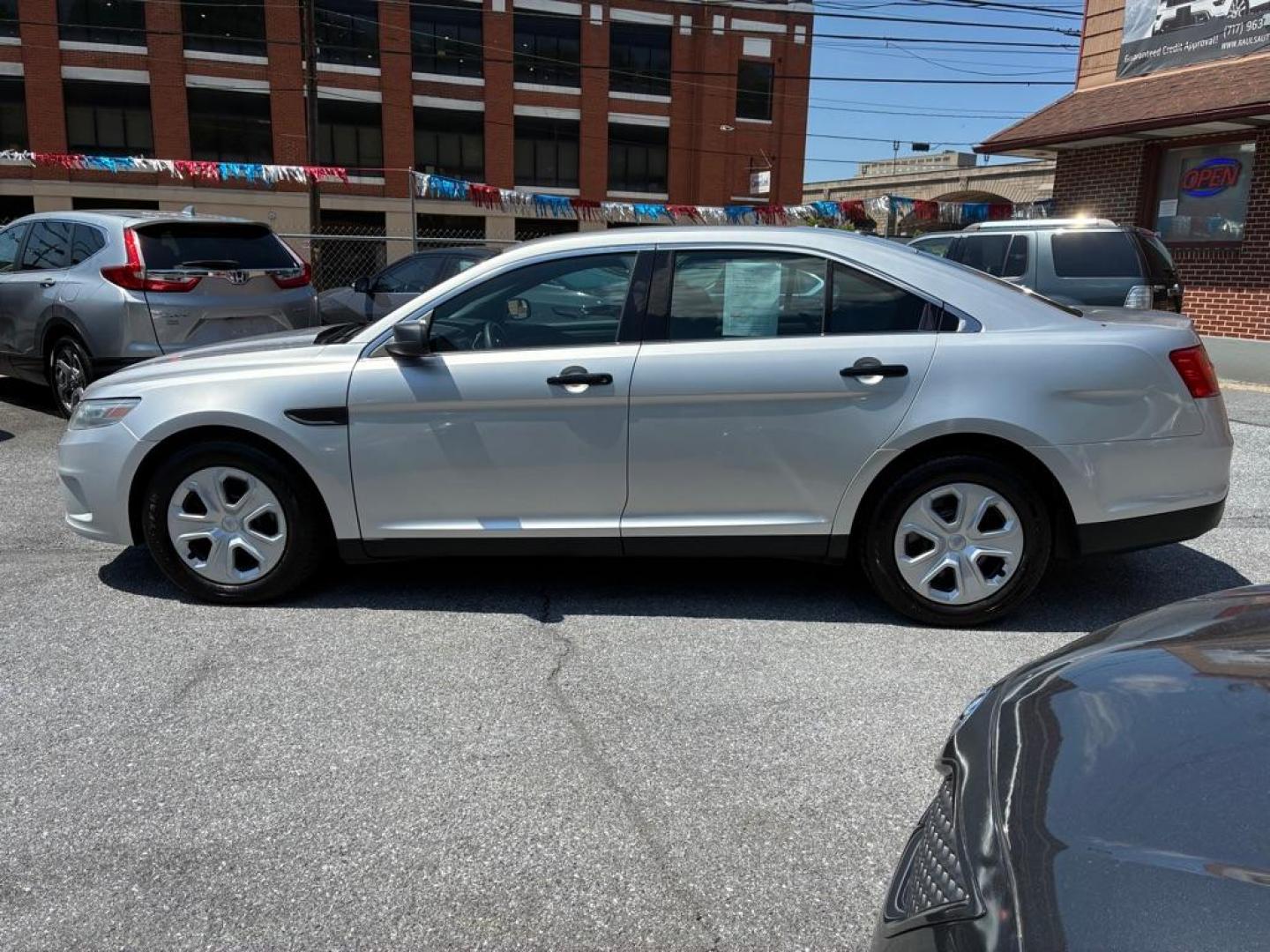 2013 SILVER FORD TAURUS POLICE INTERCEPTOR (1FAHP2M81DG) with an 3.5L engine, Automatic transmission, located at 117 North Cameron Street, Harrisburg, PA, 17101, (717) 963-8962, 40.266762, -76.875259 - WE FINANCE!!! MOST vehicles are available for financing. Good Credit/ Challenged Credit/ No Credit - ALL Trade-Ins Welcomed!!! APPLY ONLINE or CALL us TODAY Please call us to discuss your cash and/or financing options. Thanks for cheching our inventory! We're here to help. - Photo#1