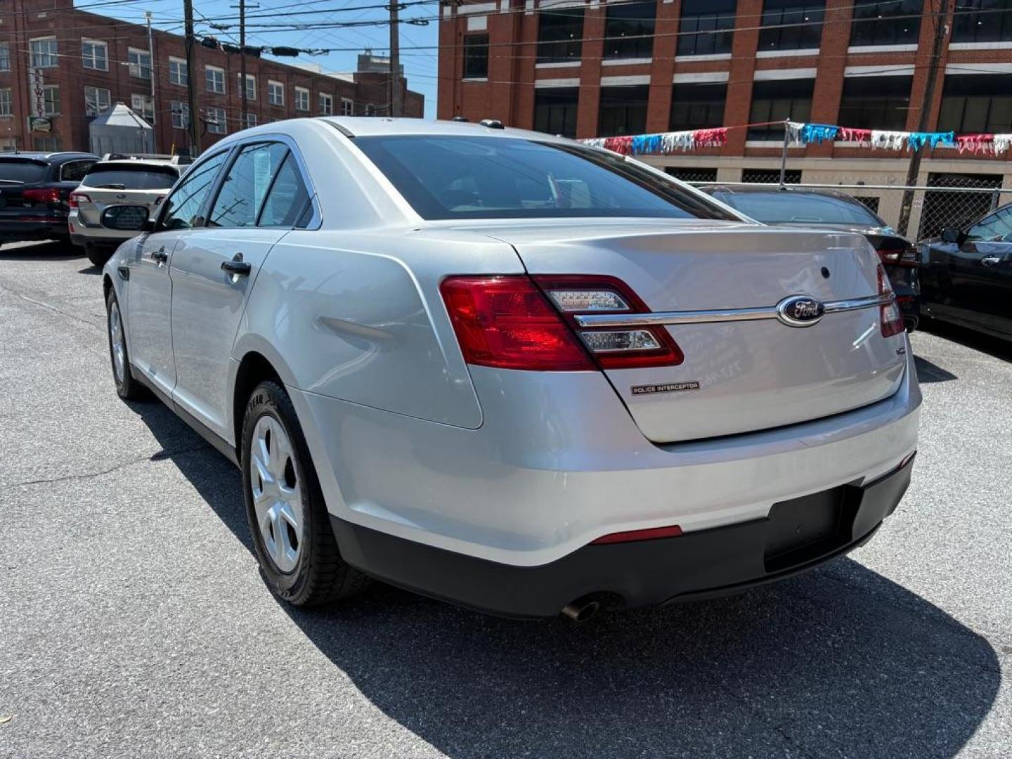 2013 SILVER FORD TAURUS POLICE INTERCEPTOR (1FAHP2M81DG) with an 3.5L engine, Automatic transmission, located at 117 North Cameron Street, Harrisburg, PA, 17101, (717) 963-8962, 40.266762, -76.875259 - WE FINANCE!!! MOST vehicles are available for financing. Good Credit/ Challenged Credit/ No Credit - ALL Trade-Ins Welcomed!!! APPLY ONLINE or CALL us TODAY Please call us to discuss your cash and/or financing options. Thanks for cheching our inventory! We're here to help. - Photo#2