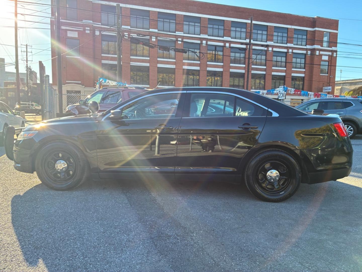 2013 BLACK FORD TAURUS POLICE INTERCEPTOR (1FAHP2MK1DG) with an 3.7L engine, Automatic transmission, located at 117 North Cameron Street, Harrisburg, PA, 17101, (717) 963-8962, 40.266762, -76.875259 - WE FINANCE!!! MOST vehicles are available for financing. Good Credit/ Challenged Credit/ No Credit - ALL Trade-Ins Welcomed!!! APPLY ONLINE or CALL us TODAY Please call us to discuss your cash and/or financing options. Thanks for checking our inventory! We're here to help.- Photo#1