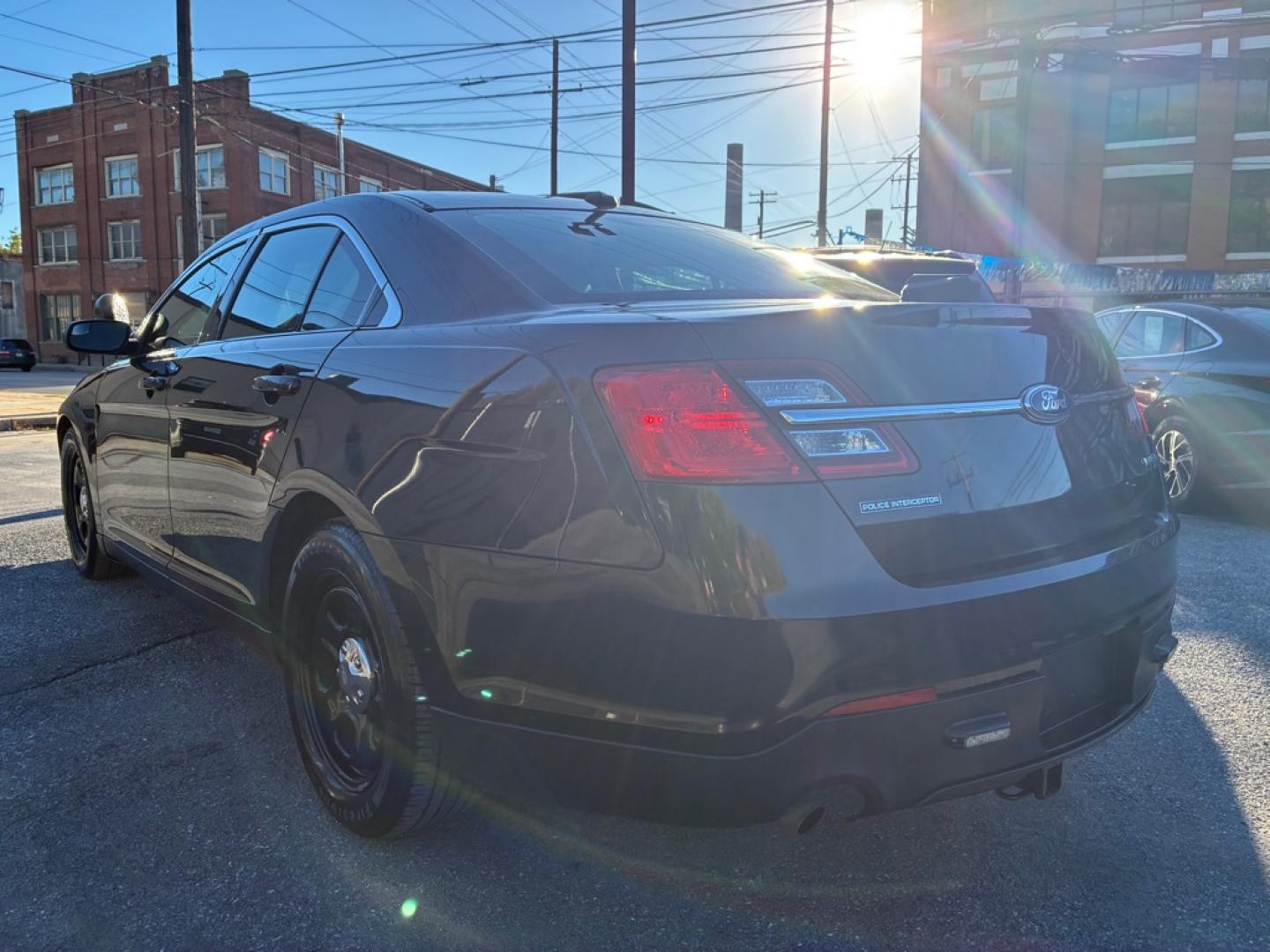 2013 BLACK FORD TAURUS POLICE INTERCEPTOR (1FAHP2MK1DG) with an 3.7L engine, Automatic transmission, located at 117 North Cameron Street, Harrisburg, PA, 17101, (717) 963-8962, 40.266762, -76.875259 - WE FINANCE!!! MOST vehicles are available for financing. Good Credit/ Challenged Credit/ No Credit - ALL Trade-Ins Welcomed!!! APPLY ONLINE or CALL us TODAY Please call us to discuss your cash and/or financing options. Thanks for checking our inventory! We're here to help.- Photo#2