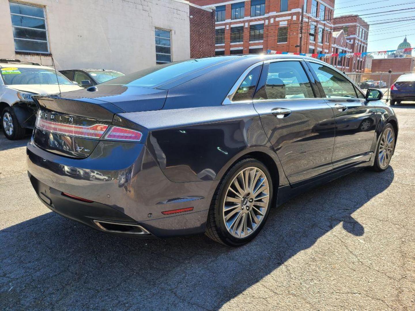 2013 GREY LINCOLN MKZ SEDAN (3LN6L2JK9DR) with an 3.7L engine, Automatic transmission, located at 7981 Paxton Street, Harrisburg, PA, 17111, (717) 561-2926, 40.261490, -76.749229 - WE FINANCE!!! Good Credit/ Bad Credit/ No Credit - ALL Trade-Ins Welcomed!!! ***Guaranteed Credit Approval*** APPLY ONLINE or CALL us TODAY ;) Internet Prices and Marketplace Prices are SPECIAL discounted ***CASH DEALS*** Retail Prices are higher. Please call us to discuss your cash and finan - Photo#3