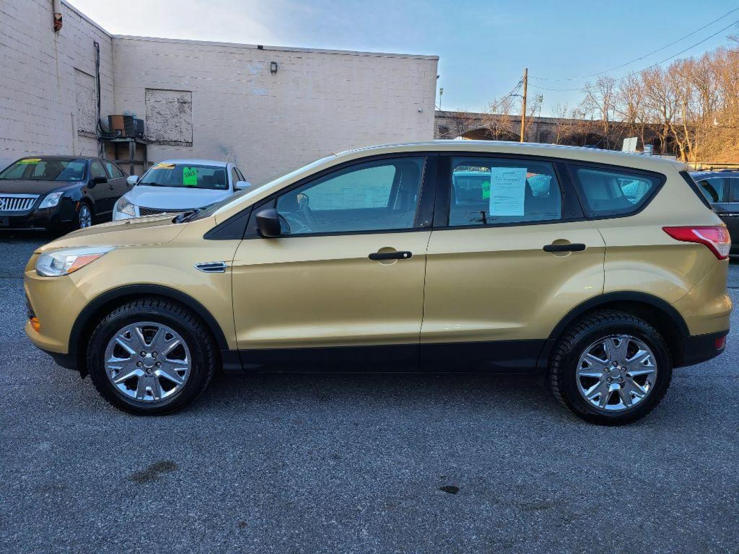2014 GOLD FORD ESCAPE S (1FMCU0F71EU) with an 2.5L engine, Automatic transmission, located at 7981 Paxton Street, Harrisburg, PA, 17111, (717) 561-2926, 40.261490, -76.749229 - WE FINANCE!!! Good Credit/ Bad Credit/ No Credit - ALL Trade-Ins Welcomed!!! ***Guaranteed Credit Approval*** APPLY ONLINE or CALL us TODAY ;) Internet Prices and Marketplace Prices are SPECIAL discounted ***CASH DEALS*** Retail Prices are higher. Please call us to discuss your cash and finan - Photo#1