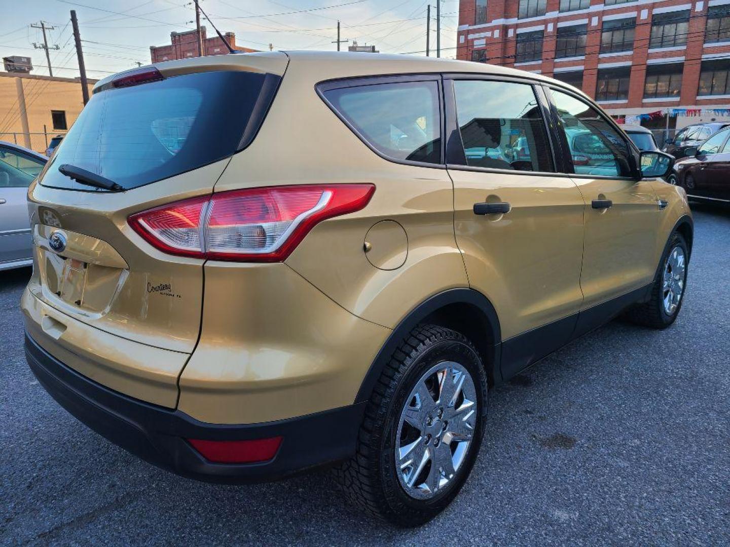 2014 GOLD FORD ESCAPE S (1FMCU0F71EU) with an 2.5L engine, Automatic transmission, located at 7981 Paxton Street, Harrisburg, PA, 17111, (717) 561-2926, 40.261490, -76.749229 - WE FINANCE!!! Good Credit/ Bad Credit/ No Credit - ALL Trade-Ins Welcomed!!! ***Guaranteed Credit Approval*** APPLY ONLINE or CALL us TODAY ;) Internet Prices and Marketplace Prices are SPECIAL discounted ***CASH DEALS*** Retail Prices are higher. Please call us to discuss your cash and finan - Photo#2