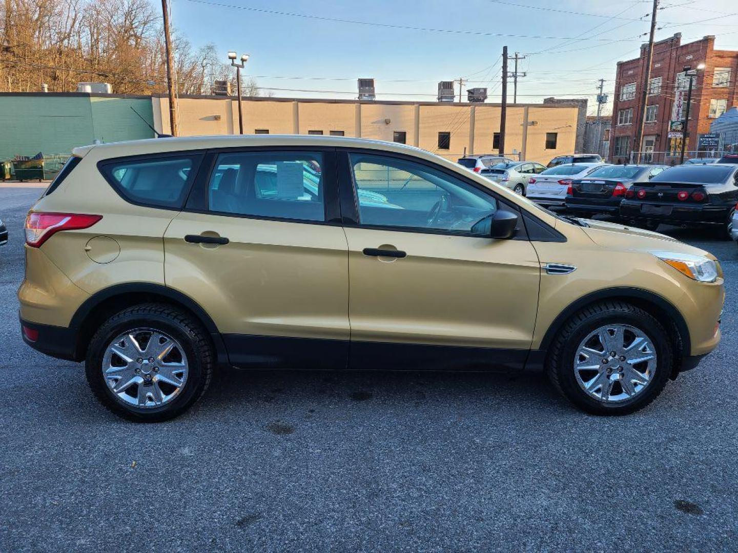 2014 GOLD FORD ESCAPE S (1FMCU0F71EU) with an 2.5L engine, Automatic transmission, located at 7981 Paxton Street, Harrisburg, PA, 17111, (717) 561-2926, 40.261490, -76.749229 - WE FINANCE!!! Good Credit/ Bad Credit/ No Credit - ALL Trade-Ins Welcomed!!! ***Guaranteed Credit Approval*** APPLY ONLINE or CALL us TODAY ;) Internet Prices and Marketplace Prices are SPECIAL discounted ***CASH DEALS*** Retail Prices are higher. Please call us to discuss your cash and finan - Photo#4
