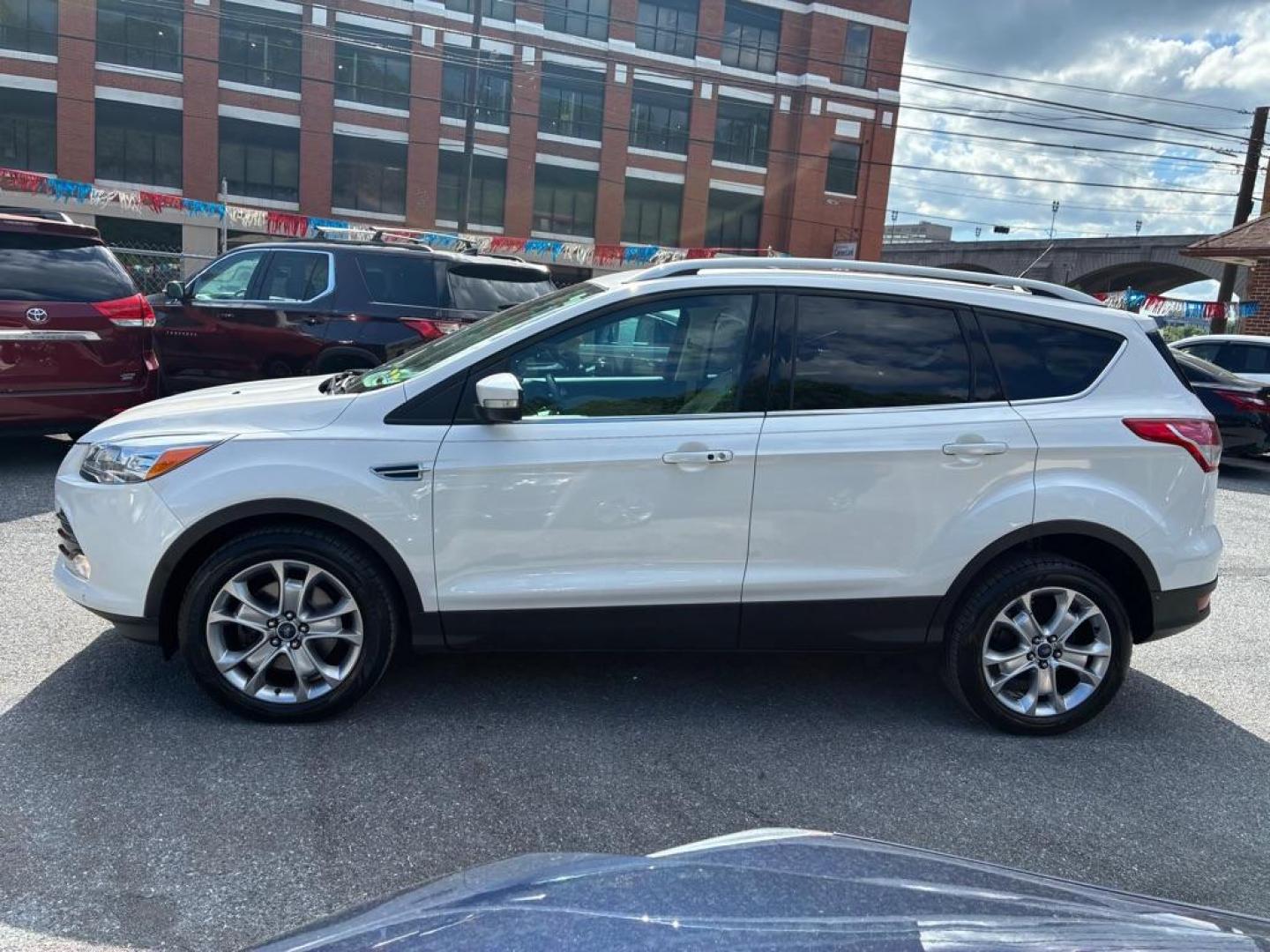2014 WHITE FORD ESCAPE TITANIUM (1FMCU9J93EU) with an 2.0L engine, Automatic transmission, located at 117 North Cameron Street, Harrisburg, PA, 17101, (717) 963-8962, 40.266762, -76.875259 - WE FINANCE!!! MOST vehicles are available for financing. Good Credit/ Challenged Credit/ No Credit - ALL Trade-Ins Welcomed!!! APPLY ONLINE or CALL us TODAY Please call us to discuss your cash and/or financing options. Thanks for checking our inventory! We're here to help. - Photo#1