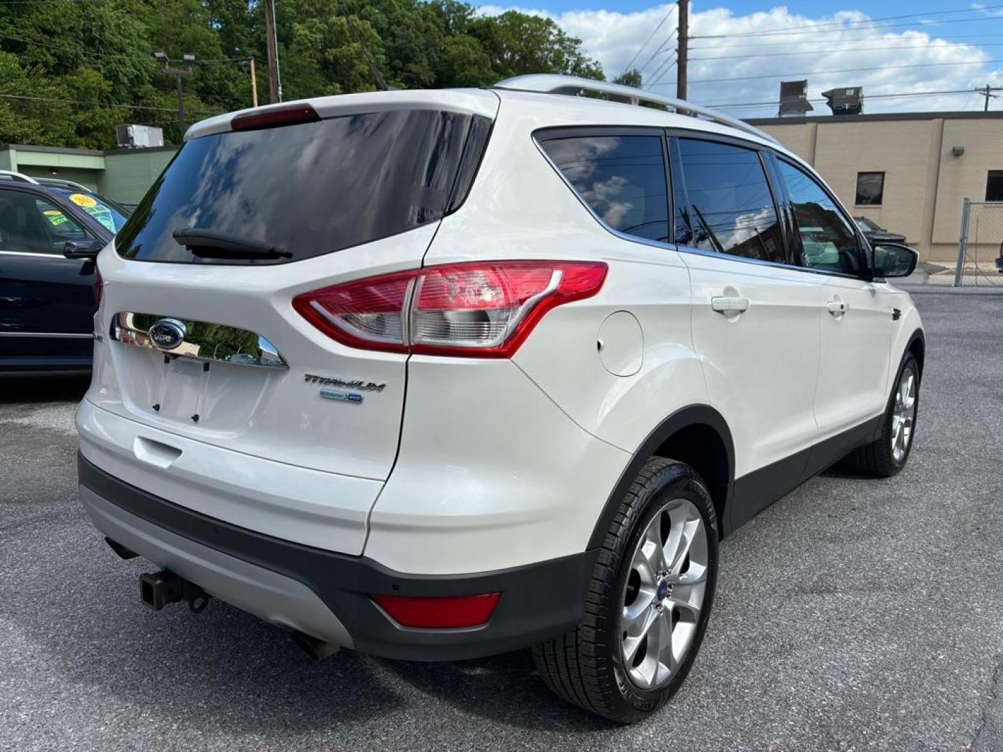 2014 WHITE FORD ESCAPE TITANIUM (1FMCU9J93EU) with an 2.0L engine, Automatic transmission, located at 117 North Cameron Street, Harrisburg, PA, 17101, (717) 963-8962, 40.266762, -76.875259 - WE FINANCE!!! MOST vehicles are available for financing. Good Credit/ Challenged Credit/ No Credit - ALL Trade-Ins Welcomed!!! APPLY ONLINE or CALL us TODAY Please call us to discuss your cash and/or financing options. Thanks for checking our inventory! We're here to help. - Photo#4