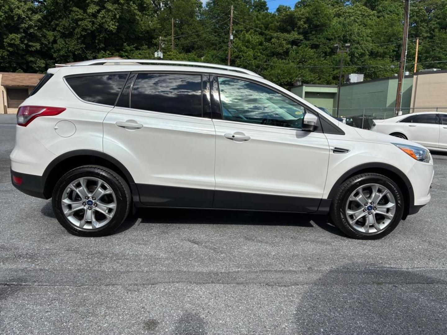 2014 WHITE FORD ESCAPE TITANIUM (1FMCU9J93EU) with an 2.0L engine, Automatic transmission, located at 117 North Cameron Street, Harrisburg, PA, 17101, (717) 963-8962, 40.266762, -76.875259 - WE FINANCE!!! MOST vehicles are available for financing. Good Credit/ Challenged Credit/ No Credit - ALL Trade-Ins Welcomed!!! APPLY ONLINE or CALL us TODAY Please call us to discuss your cash and/or financing options. Thanks for checking our inventory! We're here to help. - Photo#5
