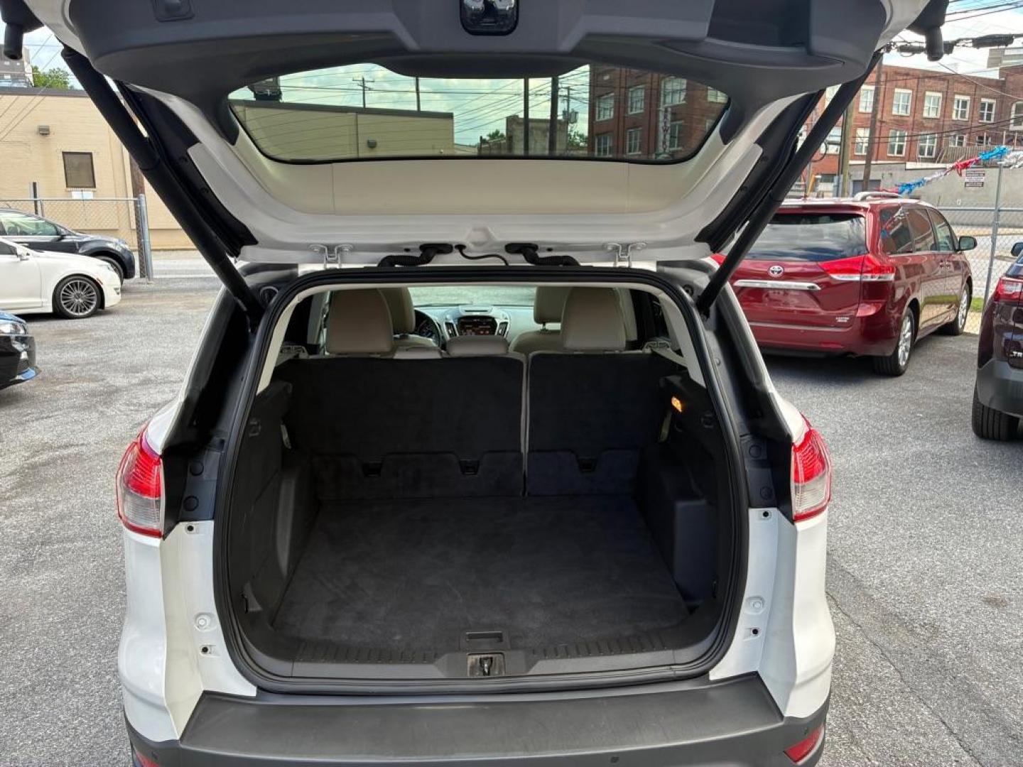 2014 WHITE FORD ESCAPE TITANIUM (1FMCU9J93EU) with an 2.0L engine, Automatic transmission, located at 117 North Cameron Street, Harrisburg, PA, 17101, (717) 963-8962, 40.266762, -76.875259 - WE FINANCE!!! MOST vehicles are available for financing. Good Credit/ Challenged Credit/ No Credit - ALL Trade-Ins Welcomed!!! APPLY ONLINE or CALL us TODAY Please call us to discuss your cash and/or financing options. Thanks for checking our inventory! We're here to help. - Photo#10