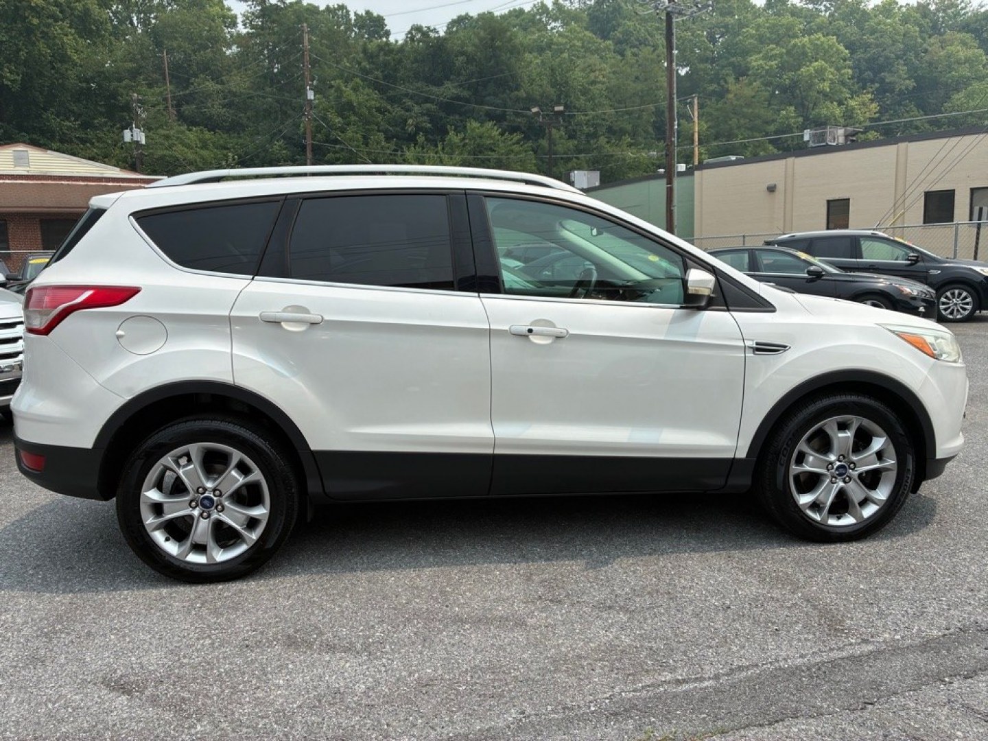 2014 WHITE FORD ESCAPE TITANIUM (1FMCU9J95EU) with an 2.0L engine, Automatic transmission, located at 117 North Cameron Street, Harrisburg, PA, 17101, (717) 963-8962, 40.266762, -76.875259 - WE FINANCE!!! MOST vehicles are available for financing. Good Credit/ Challenged Credit/ No Credit - ALL Trade-Ins Welcomed!!! APPLY ONLINE or CALL us TODAY Please call us to discuss your cash and/or financing options. Thanks for checking our inventory! We're here to help.- Photo#5