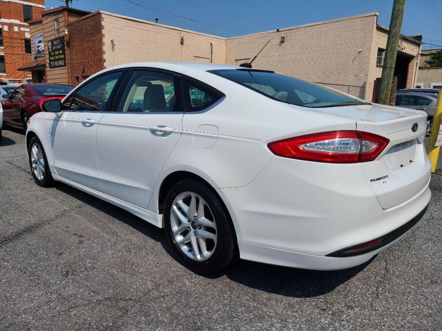 2014 WHITE FORD FUSION SE (1FA6P0H74E5) with an 2.5L engine, Automatic transmission, located at 117 North Cameron Street, Harrisburg, PA, 17101, (717) 963-8962, 40.266762, -76.875259 - WE FINANCE!!! Good Credit/ Bad Credit/ No Credit - ALL Trade-Ins Welcomed!!! ***Guaranteed Credit Approval*** APPLY ONLINE or CALL us TODAY ;) Internet Prices and Marketplace Prices are SPECIAL discounted ***CASH DEALS*** Retail Prices are higher. Please call us to discuss your cash and finan - Photo#2