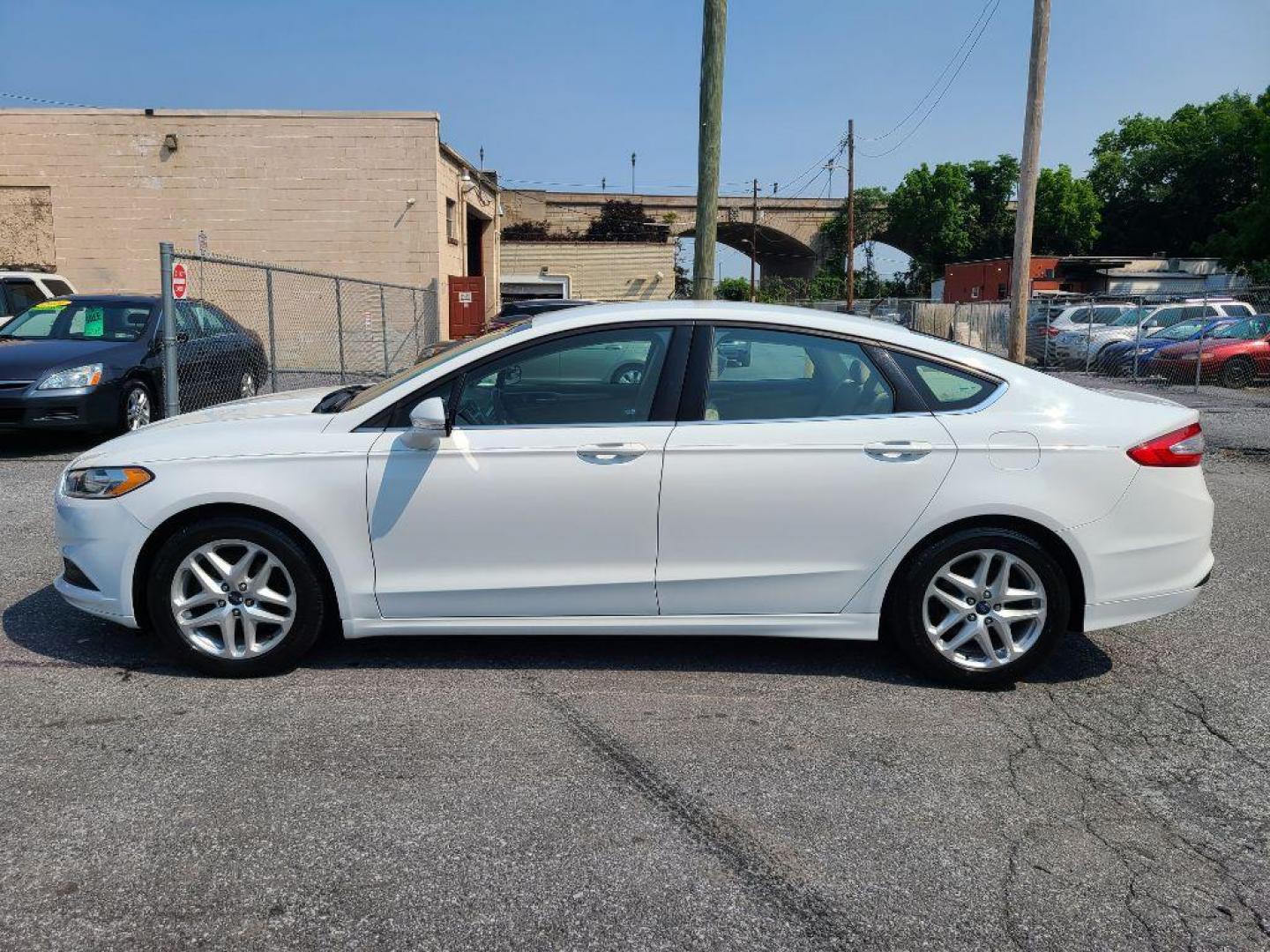 2014 WHITE FORD FUSION SE (1FA6P0H74E5) with an 2.5L engine, Automatic transmission, located at 117 North Cameron Street, Harrisburg, PA, 17101, (717) 963-8962, 40.266762, -76.875259 - WE FINANCE!!! Good Credit/ Bad Credit/ No Credit - ALL Trade-Ins Welcomed!!! ***Guaranteed Credit Approval*** APPLY ONLINE or CALL us TODAY ;) Internet Prices and Marketplace Prices are SPECIAL discounted ***CASH DEALS*** Retail Prices are higher. Please call us to discuss your cash and finan - Photo#1