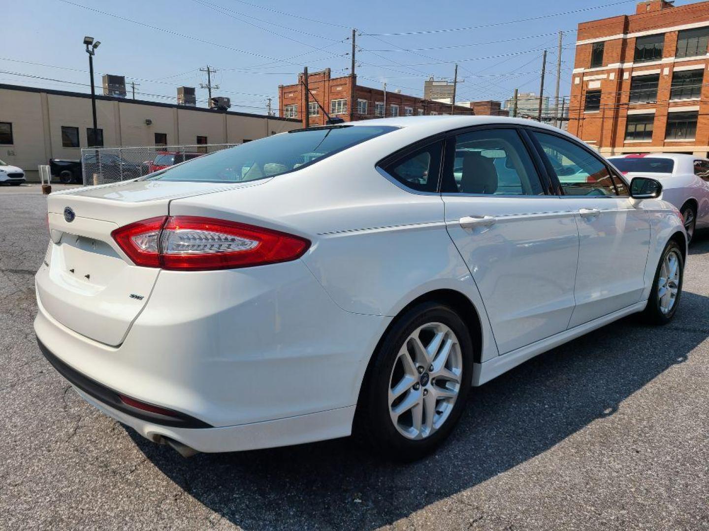 2014 WHITE FORD FUSION SE (1FA6P0H74E5) with an 2.5L engine, Automatic transmission, located at 117 North Cameron Street, Harrisburg, PA, 17101, (717) 963-8962, 40.266762, -76.875259 - WE FINANCE!!! Good Credit/ Bad Credit/ No Credit - ALL Trade-Ins Welcomed!!! ***Guaranteed Credit Approval*** APPLY ONLINE or CALL us TODAY ;) Internet Prices and Marketplace Prices are SPECIAL discounted ***CASH DEALS*** Retail Prices are higher. Please call us to discuss your cash and finan - Photo#4