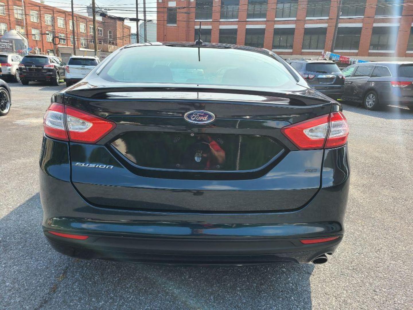 2014 GRAY FORD FUSION SE (3FA6P0H78ER) with an 2.5L engine, Automatic transmission, located at 117 North Cameron Street, Harrisburg, PA, 17101, (717) 963-8962, 40.266762, -76.875259 - WE FINANCE!!! Good Credit/ Bad Credit/ No Credit - ALL Trade-Ins Welcomed!!! ***Guaranteed Credit Approval*** APPLY ONLINE or CALL us TODAY ;) Internet Prices and Marketplace Prices are SPECIAL discounted ***CASH DEALS*** Retail Prices are higher. Please call us to discuss your cash and finan - Photo#2