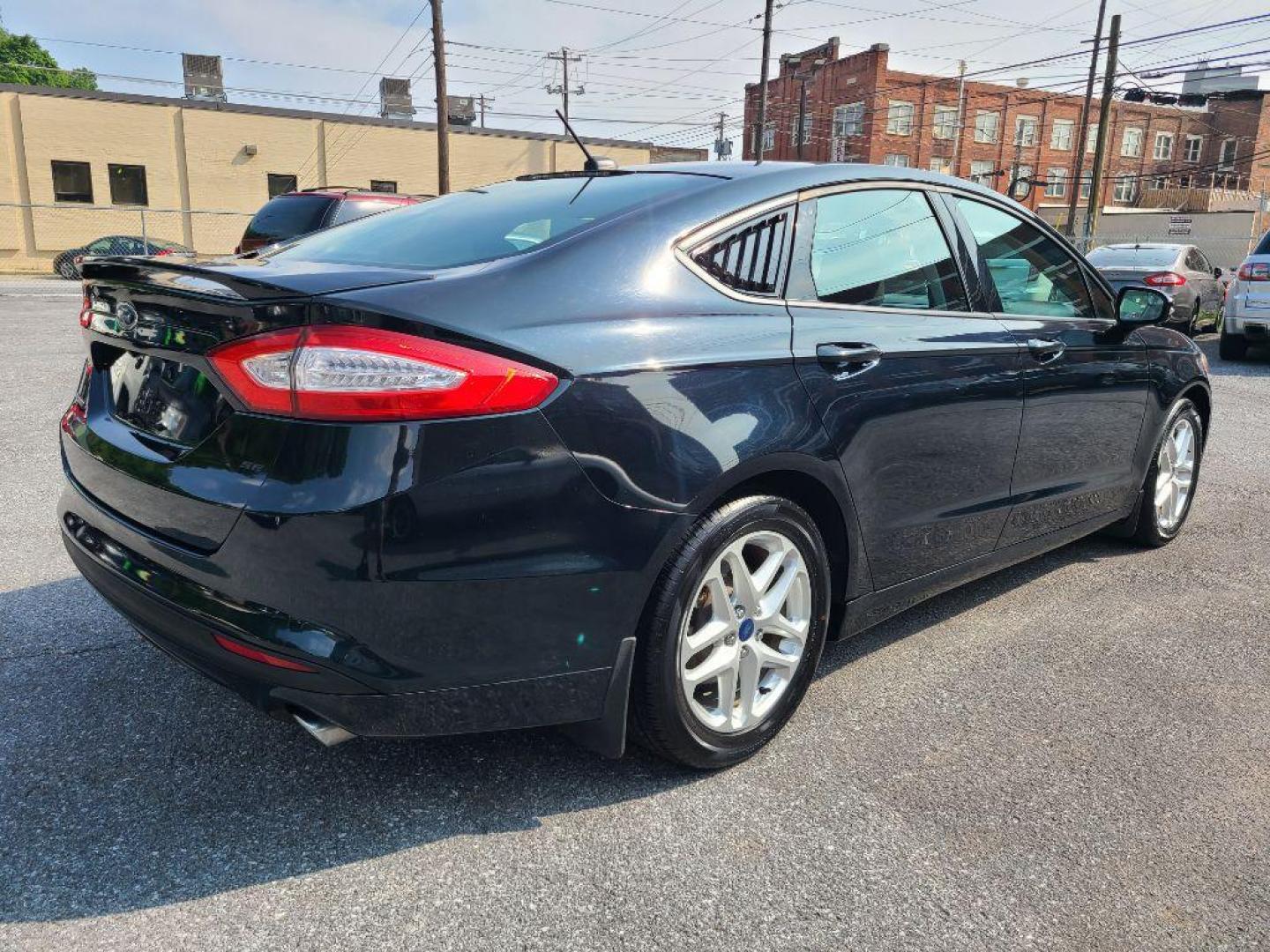 2014 GRAY FORD FUSION SE (3FA6P0H78ER) with an 2.5L engine, Automatic transmission, located at 117 North Cameron Street, Harrisburg, PA, 17101, (717) 963-8962, 40.266762, -76.875259 - WE FINANCE!!! Good Credit/ Bad Credit/ No Credit - ALL Trade-Ins Welcomed!!! ***Guaranteed Credit Approval*** APPLY ONLINE or CALL us TODAY ;) Internet Prices and Marketplace Prices are SPECIAL discounted ***CASH DEALS*** Retail Prices are higher. Please call us to discuss your cash and finan - Photo#5