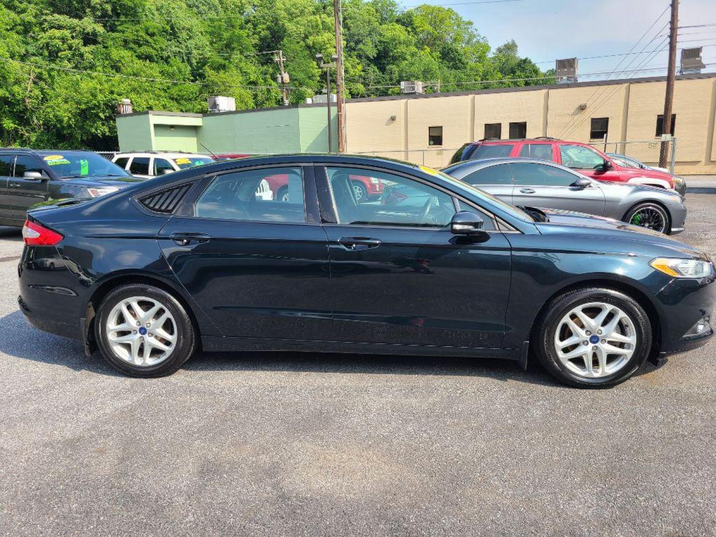 2014 GRAY FORD FUSION SE (3FA6P0H78ER) with an 2.5L engine, Automatic transmission, located at 117 North Cameron Street, Harrisburg, PA, 17101, (717) 963-8962, 40.266762, -76.875259 - WE FINANCE!!! Good Credit/ Bad Credit/ No Credit - ALL Trade-Ins Welcomed!!! ***Guaranteed Credit Approval*** APPLY ONLINE or CALL us TODAY ;) Internet Prices and Marketplace Prices are SPECIAL discounted ***CASH DEALS*** Retail Prices are higher. Please call us to discuss your cash and finan - Photo#6