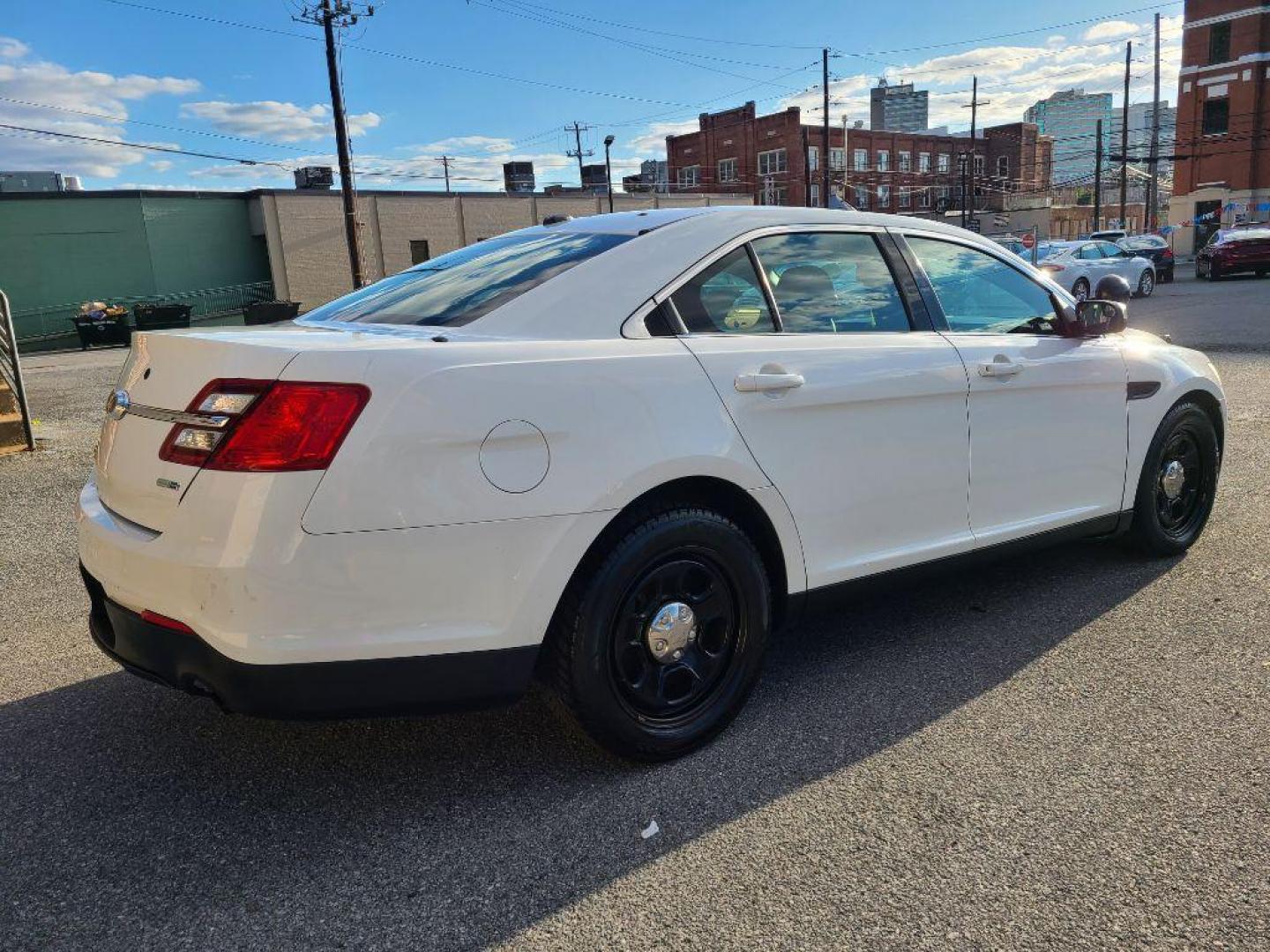 2014 WHITE FORD TAURUS POLICE INTERCEPTOR (1FAHP2MK5EG) with an 3.7L engine, Automatic transmission, located at 117 North Cameron Street, Harrisburg, PA, 17101, (717) 963-8962, 40.266762, -76.875259 - WE FINANCE!!! Good Credit/ Bad Credit/ No Credit - ALL Trade-Ins Welcomed!!! ***Guaranteed Credit Approval*** APPLY ONLINE or CALL us TODAY ;) Please call us to discuss your cash and financing options. - Photo#4