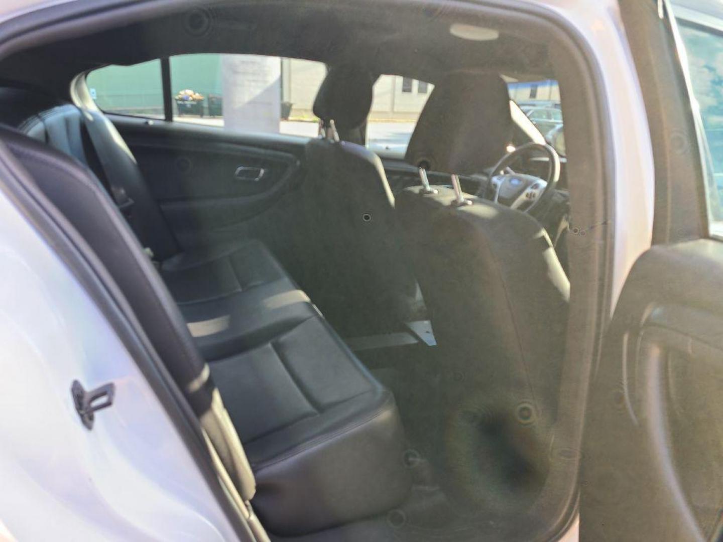 2014 WHITE FORD TAURUS POLICE INTERCEPTOR (1FAHP2MK5EG) with an 3.7L engine, Automatic transmission, located at 117 North Cameron Street, Harrisburg, PA, 17101, (717) 963-8962, 40.266762, -76.875259 - WE FINANCE!!! Good Credit/ Bad Credit/ No Credit - ALL Trade-Ins Welcomed!!! ***Guaranteed Credit Approval*** APPLY ONLINE or CALL us TODAY ;) Please call us to discuss your cash and financing options. - Photo#13